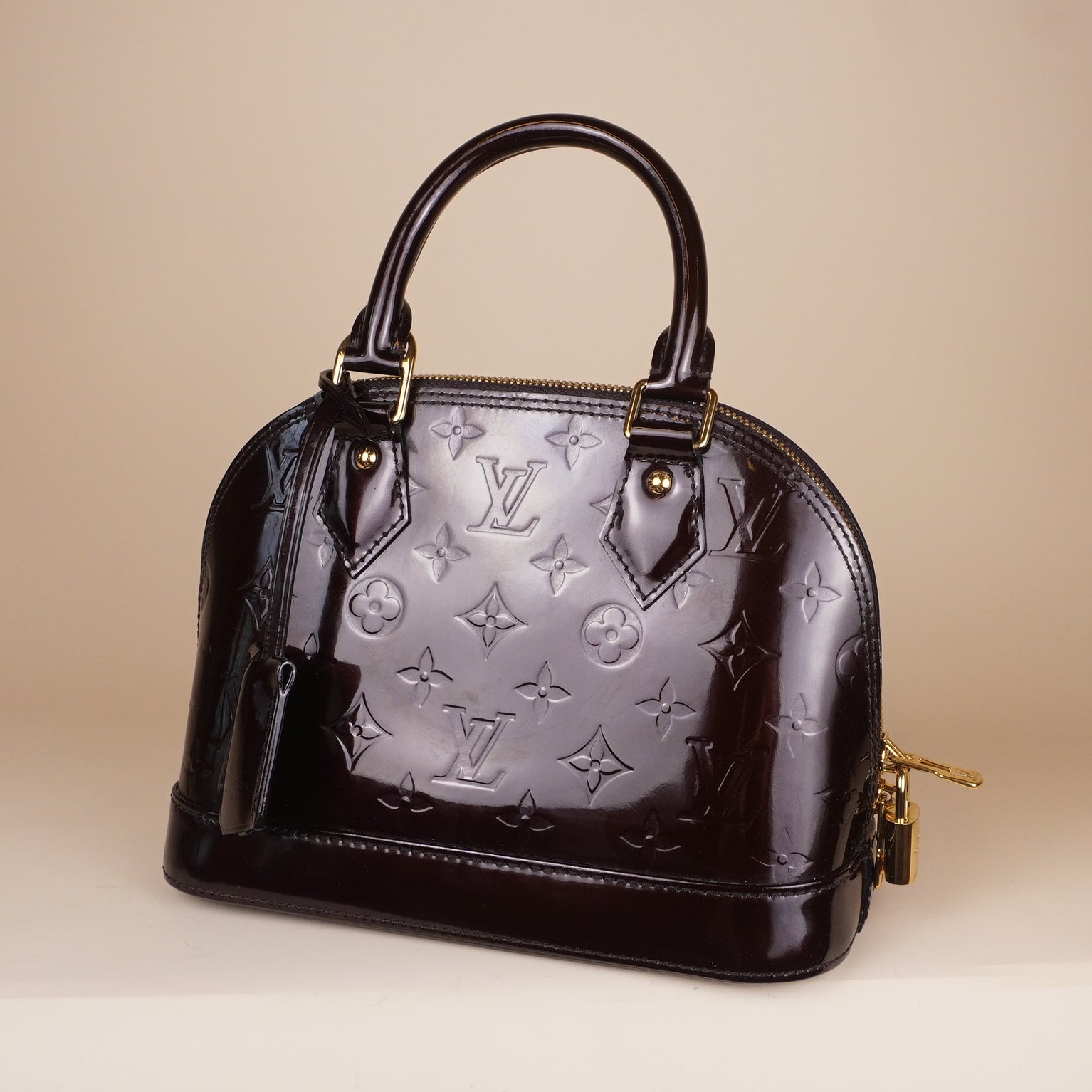 PRE-OWNED LV Vernis Alma PM Amarante