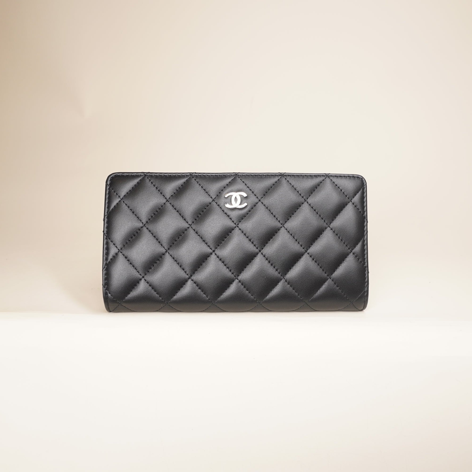 PRE-OWNED CC Black Lambskin Quilted Yen Wallet