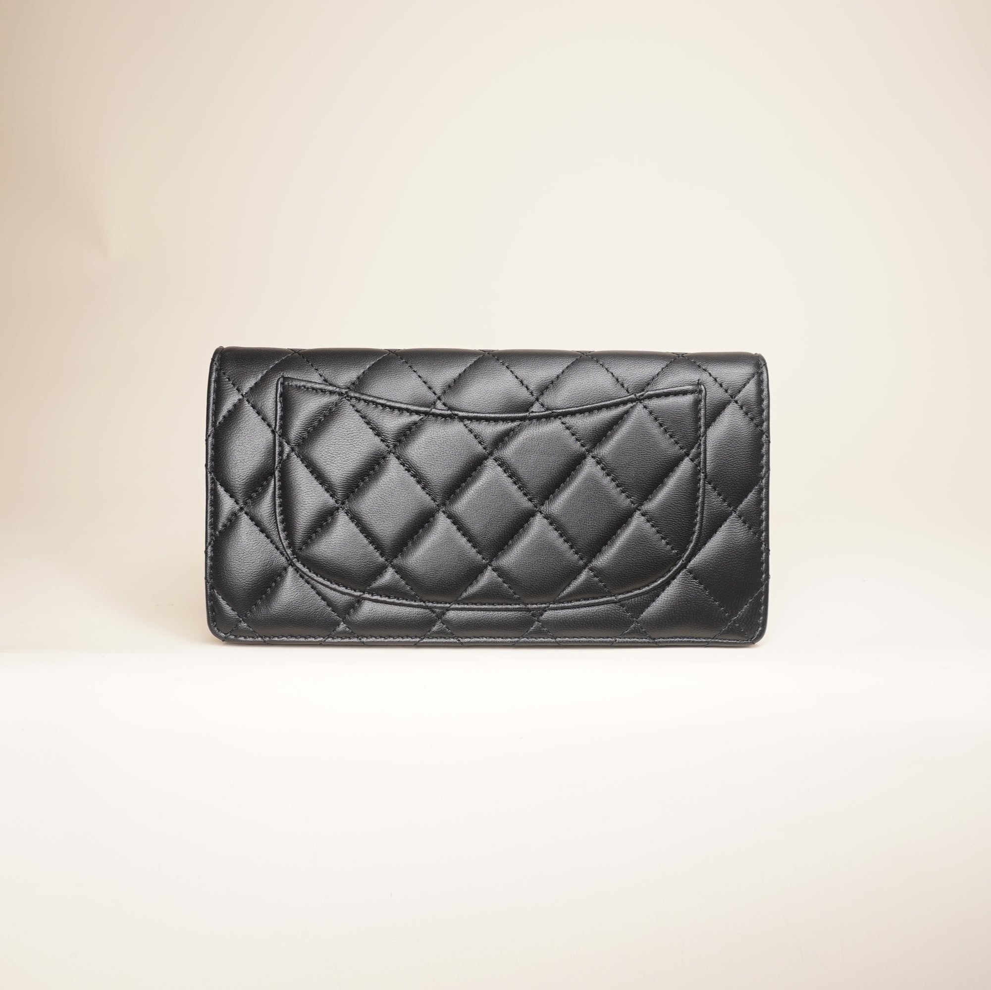 PRE-OWNED CC Black Lambskin Quilted Yen Wallet