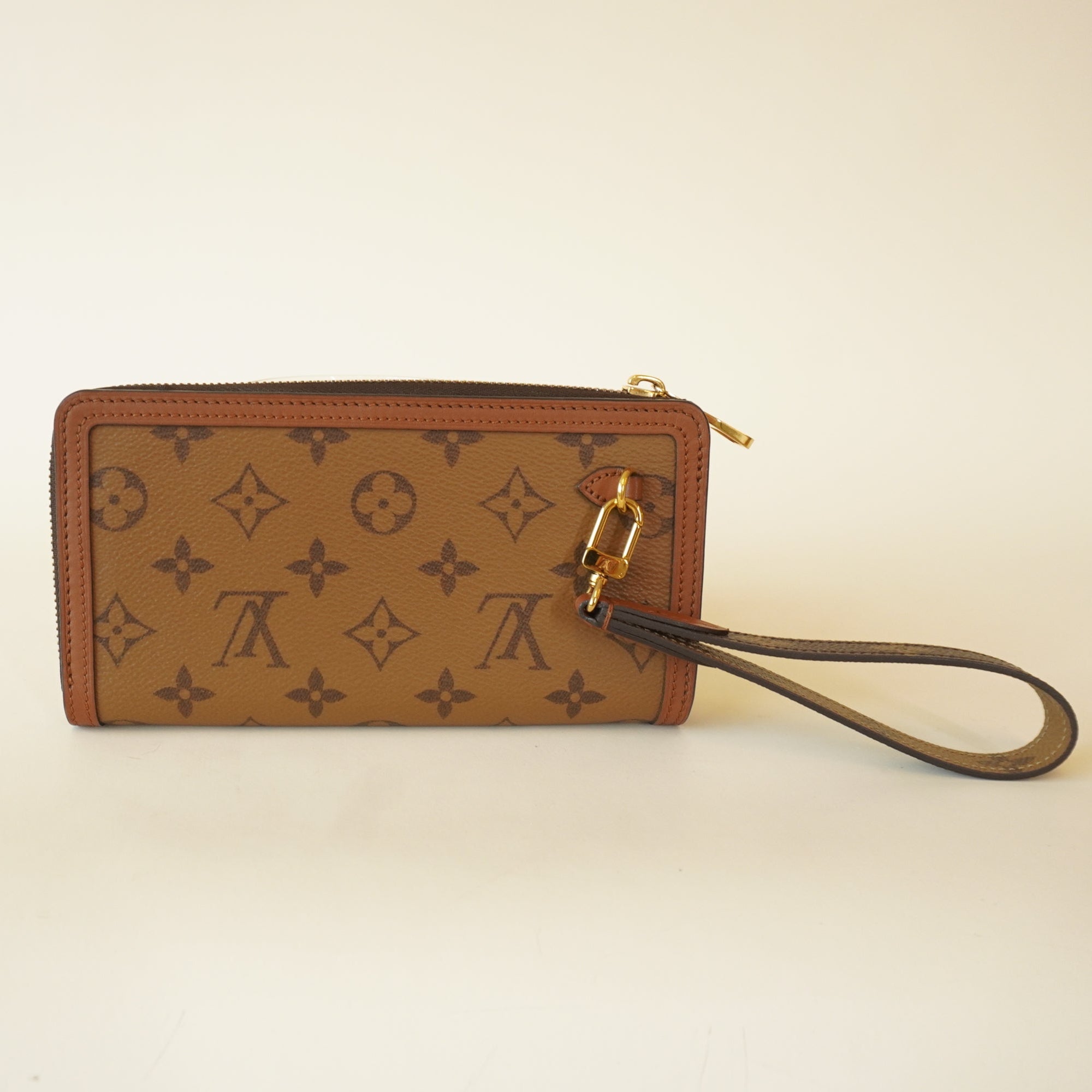 PRE-OWNED LV Reverse Monogram Canvas Dauphine Clutch