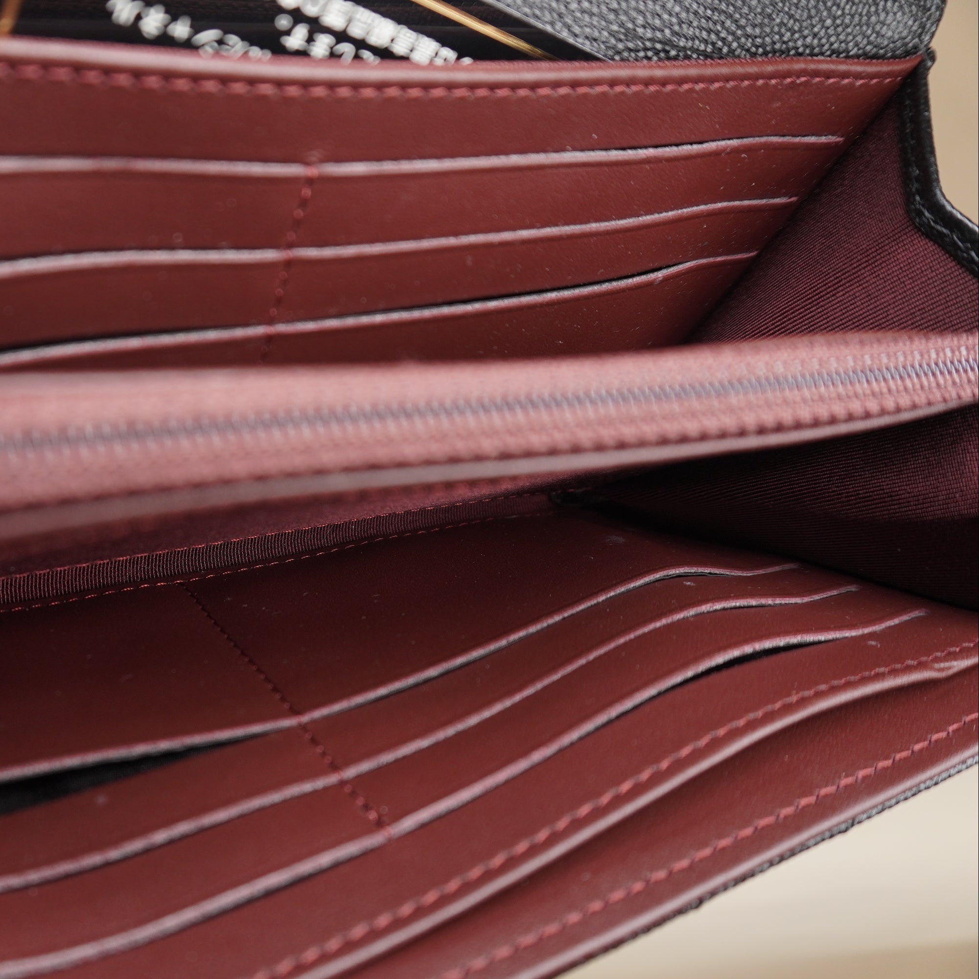 PRE-OWNED CC Black Caviar Chevron Quilted Large Wallet