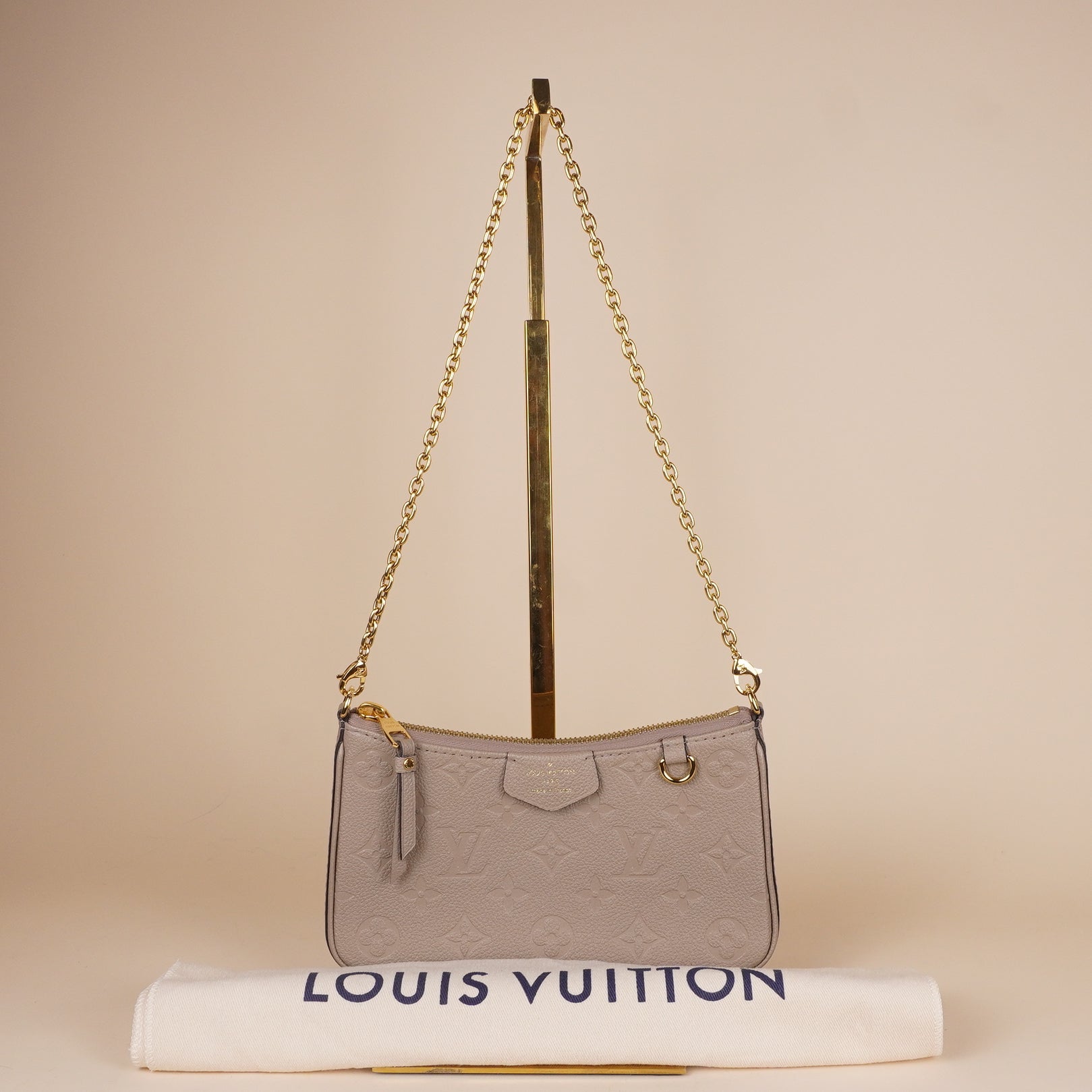 PRE-OWNED LV Empreinte Easy Pouch On Strap Tourterelle