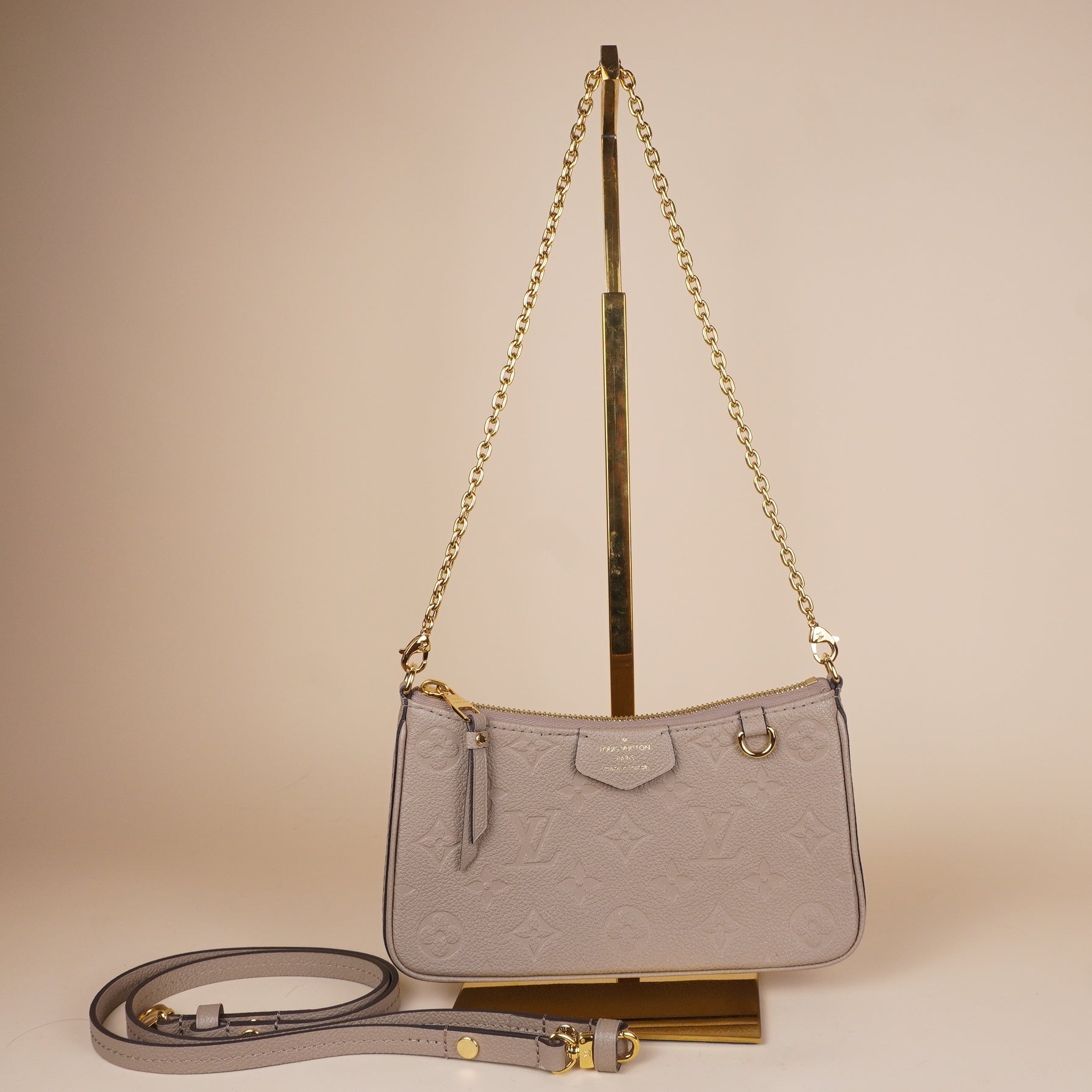 PRE-OWNED LV Empreinte Easy Pouch On Strap Tourterelle