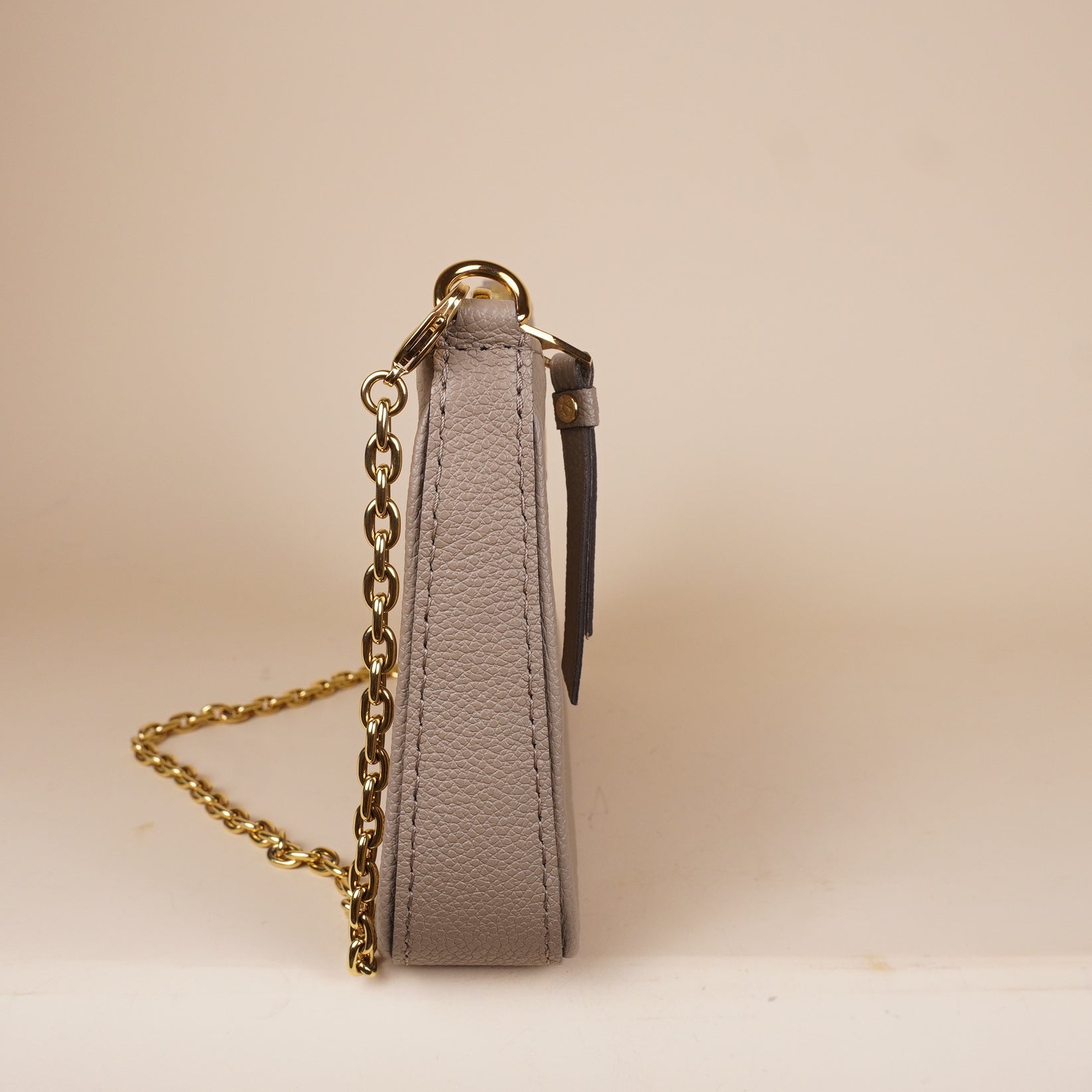 PRE-OWNED LV Empreinte Easy Pouch On Strap Tourterelle