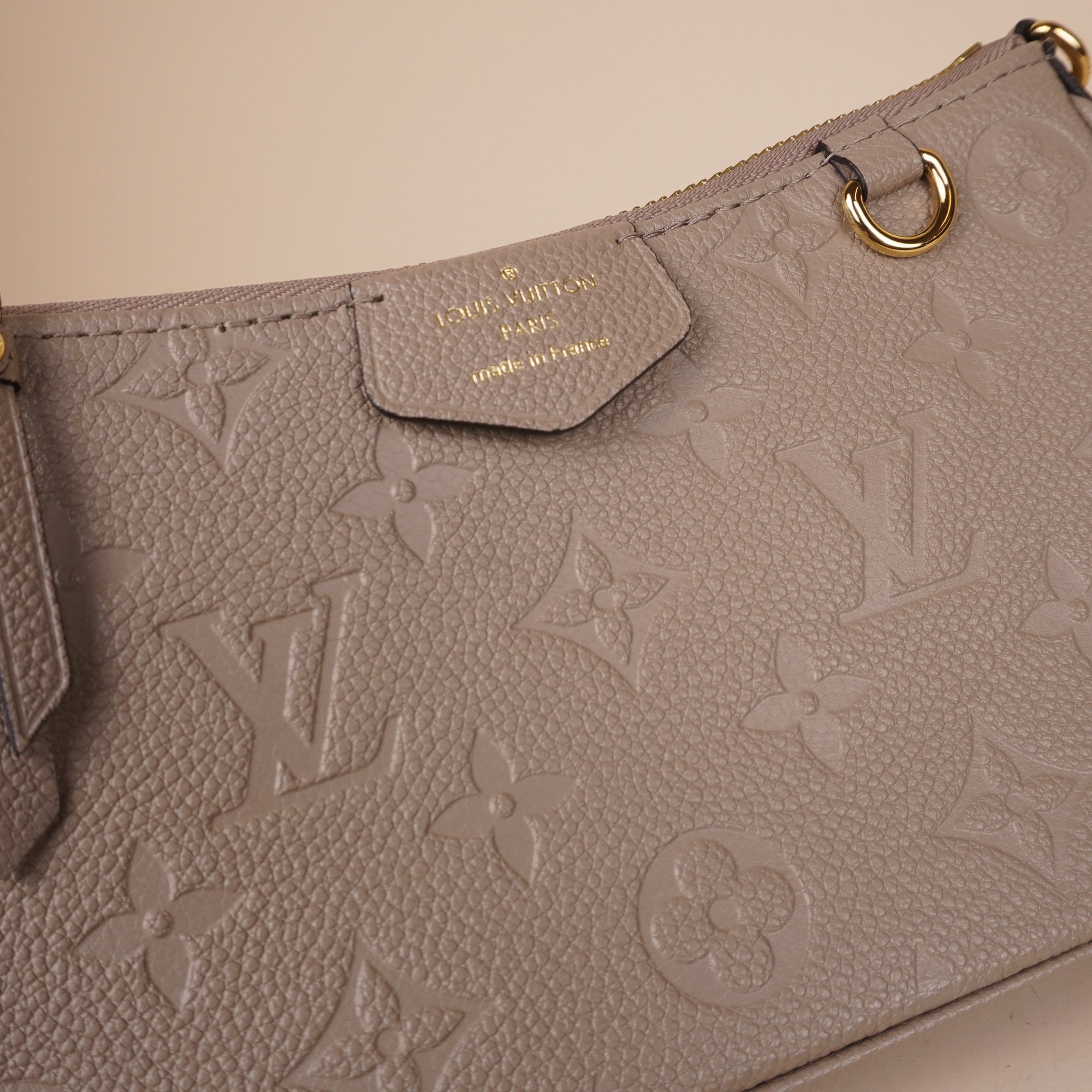PRE-OWNED LV Empreinte Easy Pouch On Strap Tourterelle