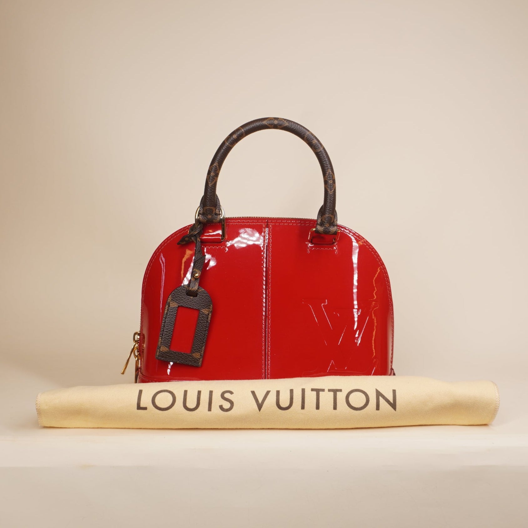 PRE-OWEND LV Scarlet Vernis Monogram Alma BB Shoulder Bag