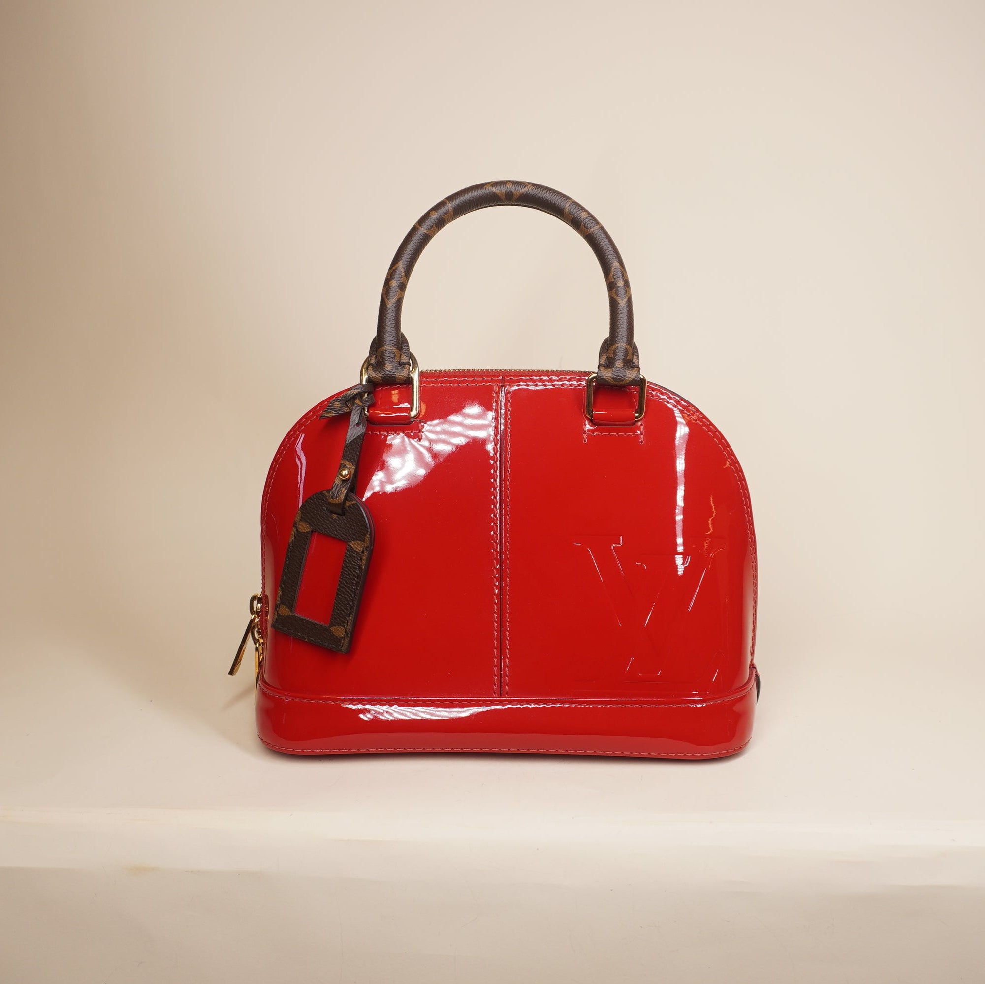 PRE-OWEND LV Scarlet Vernis Monogram Alma BB Shoulder Bag