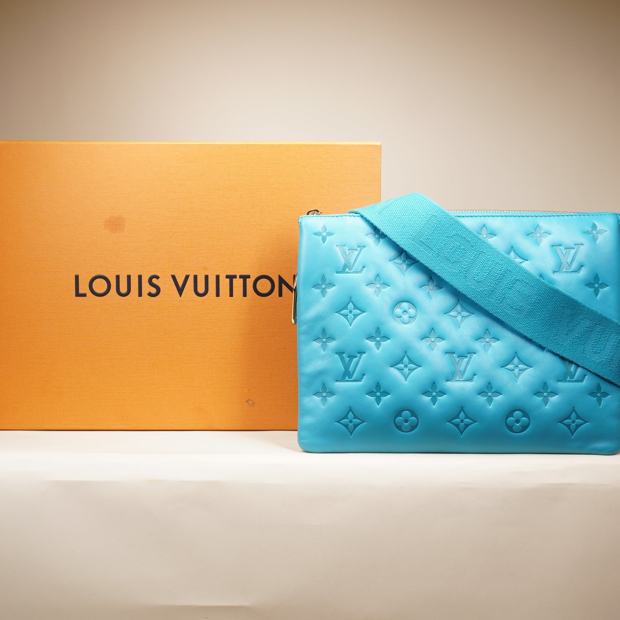 PRE-OWNED Lambskin Embossed Monogram Coussin PM Blue