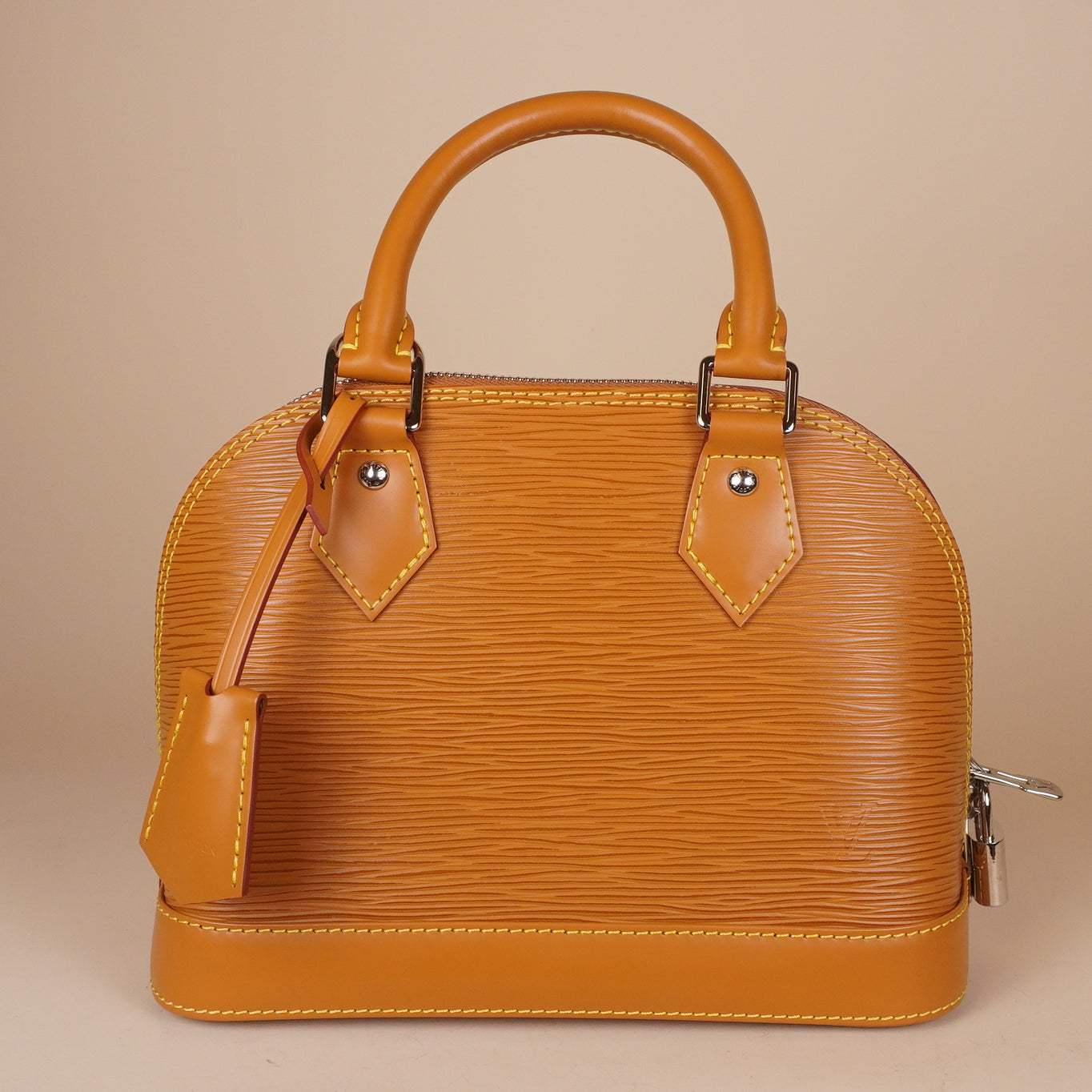 PRE-OWNED LV Epi Jacquard Alma BB Honey Gold