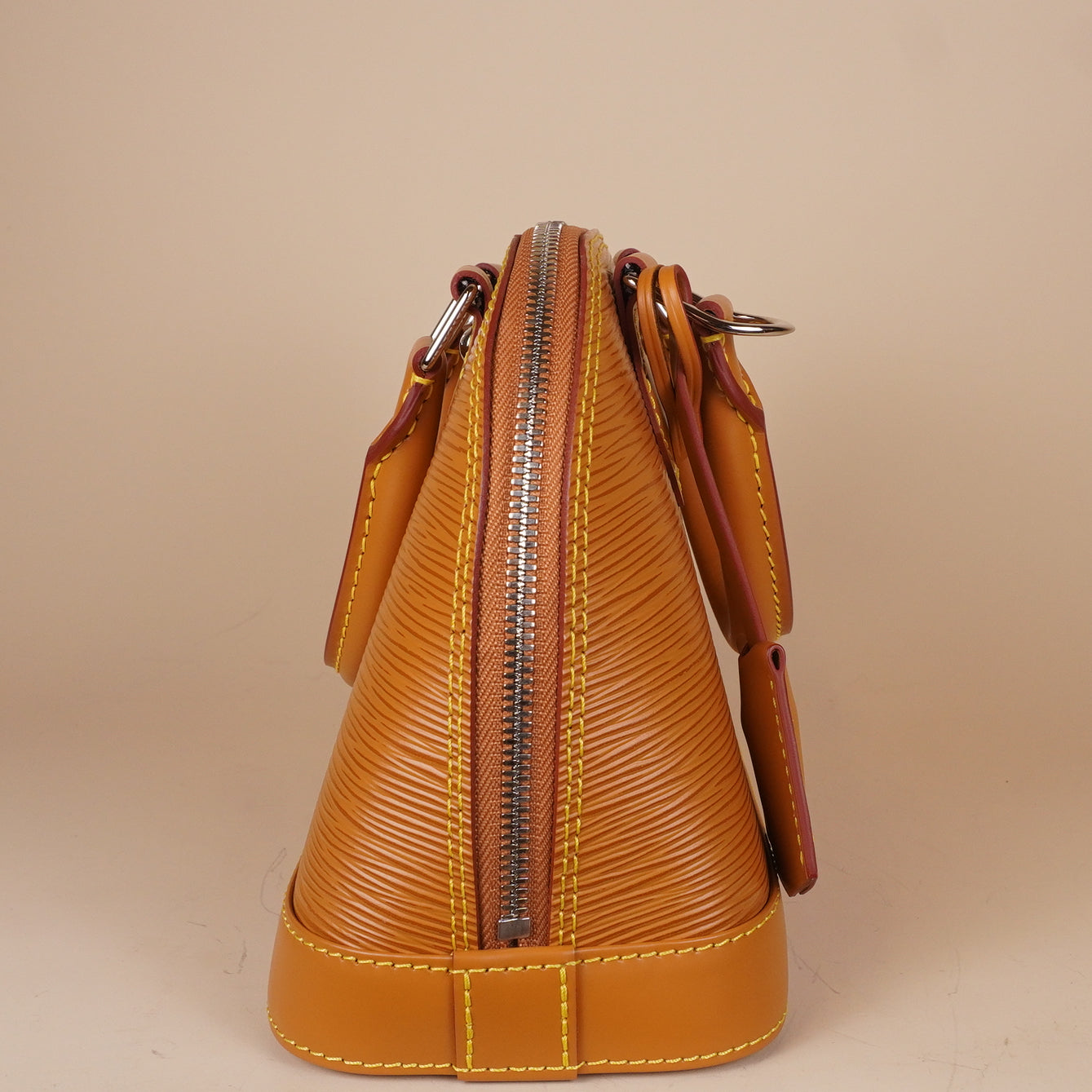 PRE-OWNED LV Epi Jacquard Alma BB Honey Gold