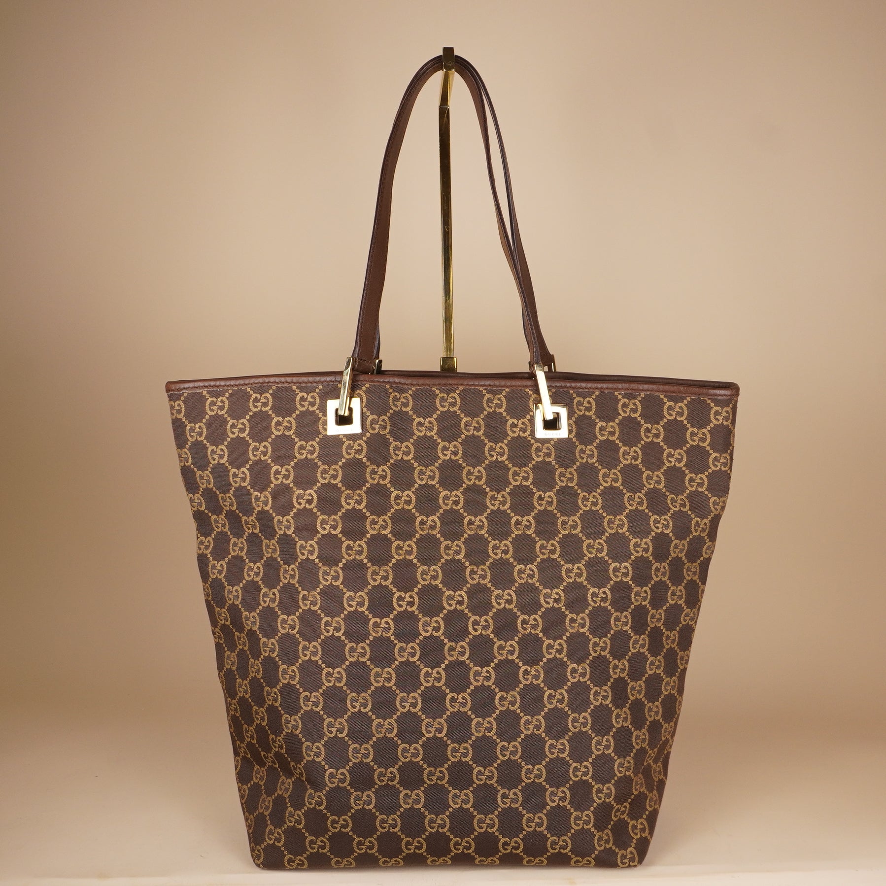 PRE-OWNED GG Brown Gold Canvas Tote Bag