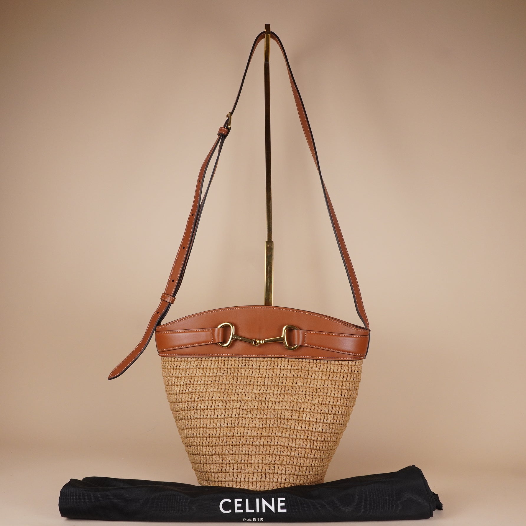 PRE-OWNED Horsebit Crecy Bucket Bag Raffia