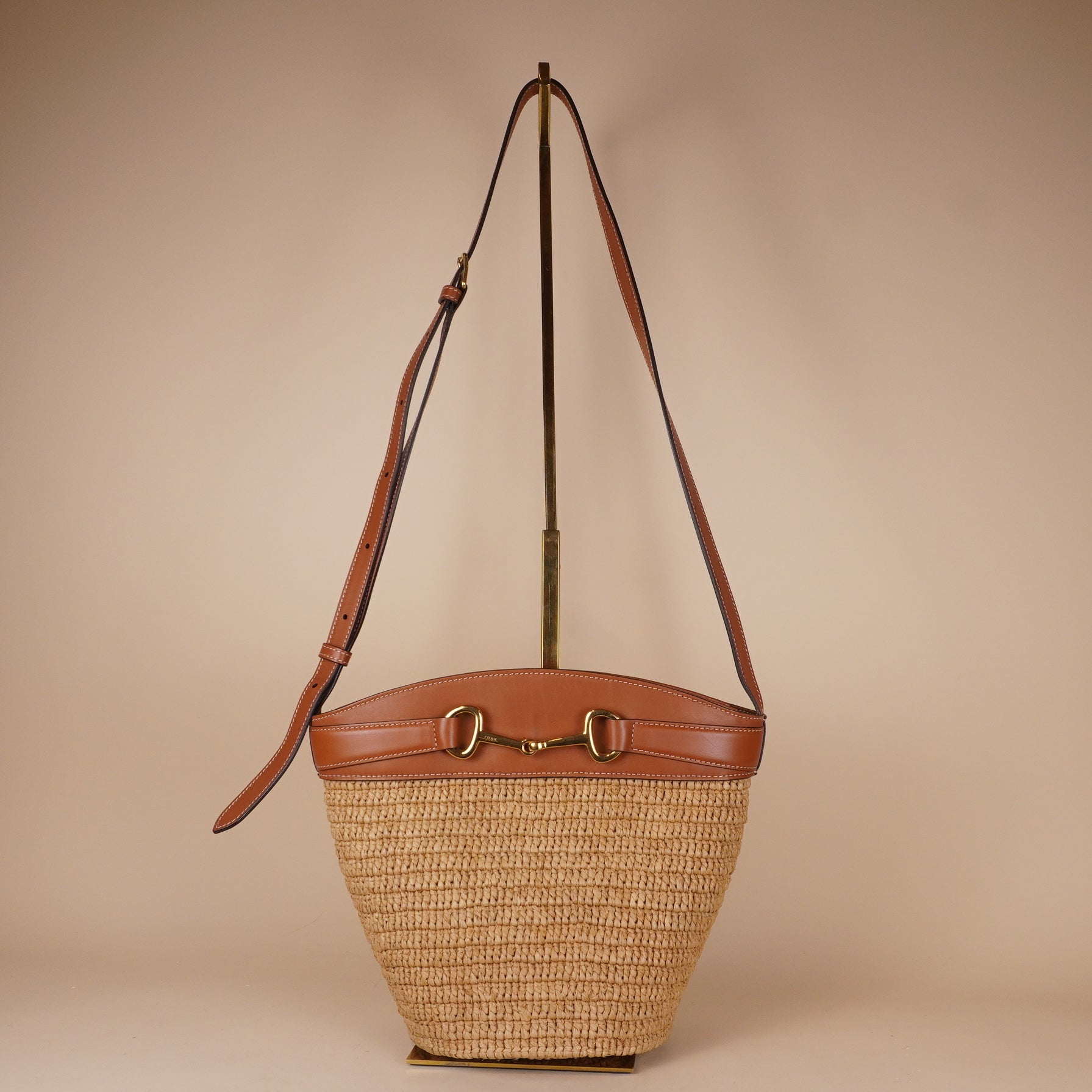 PRE-OWNED Horsebit Crecy Bucket Bag Raffia