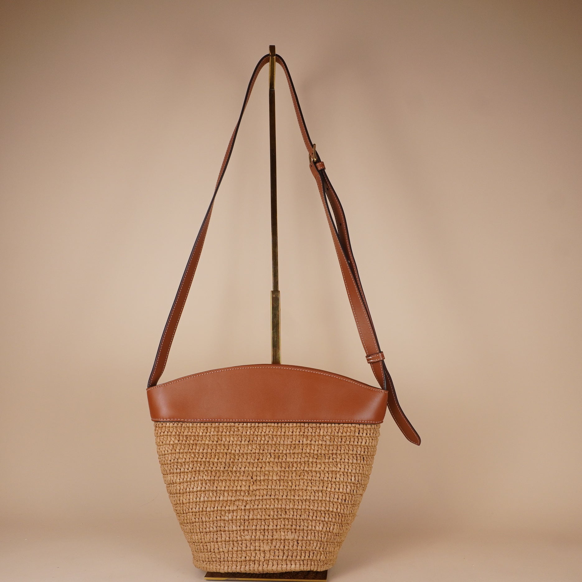 PRE-OWNED Horsebit Crecy Bucket Bag Raffia