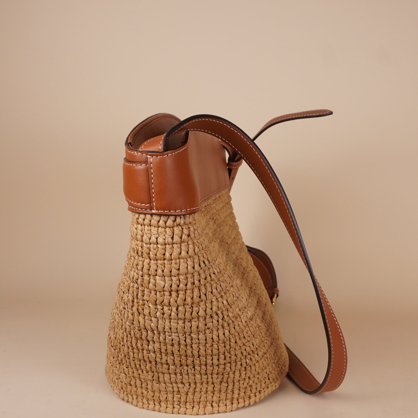 PRE-OWNED Horsebit Crecy Bucket Bag Raffia