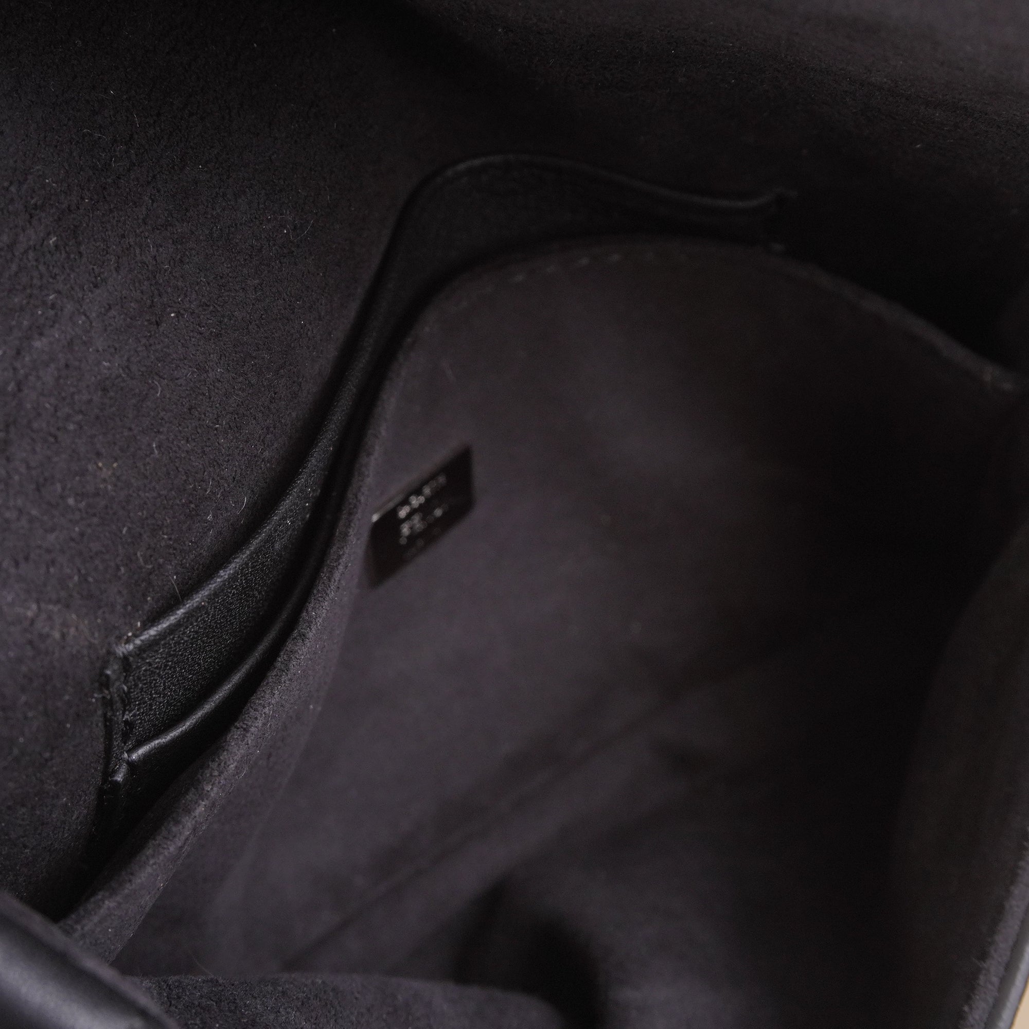 PRE-OWNED FF Baguette Micro Monster Fur and Black Leather Bag