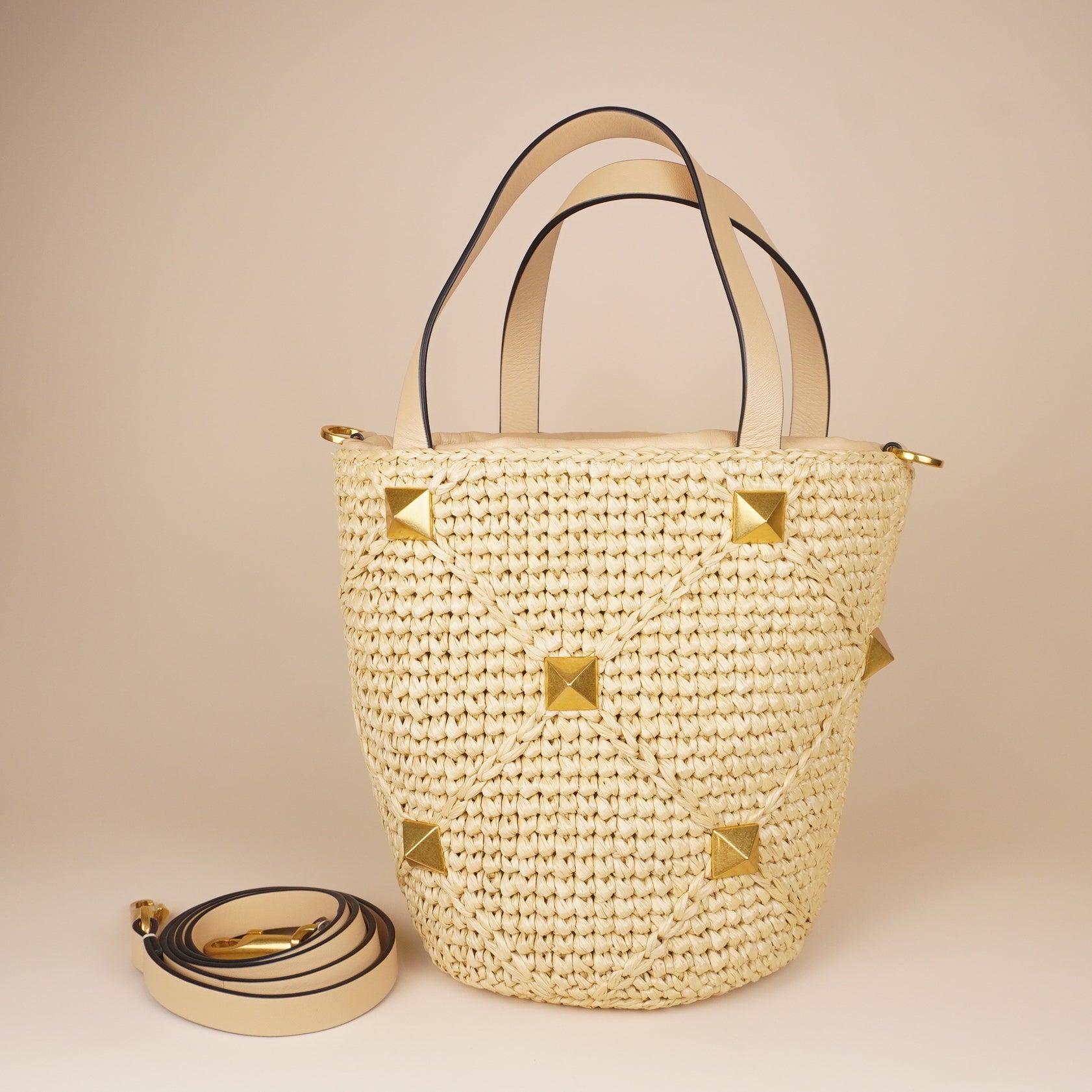 PRE-OWNED Roman Stud Raffia Bucket Bag