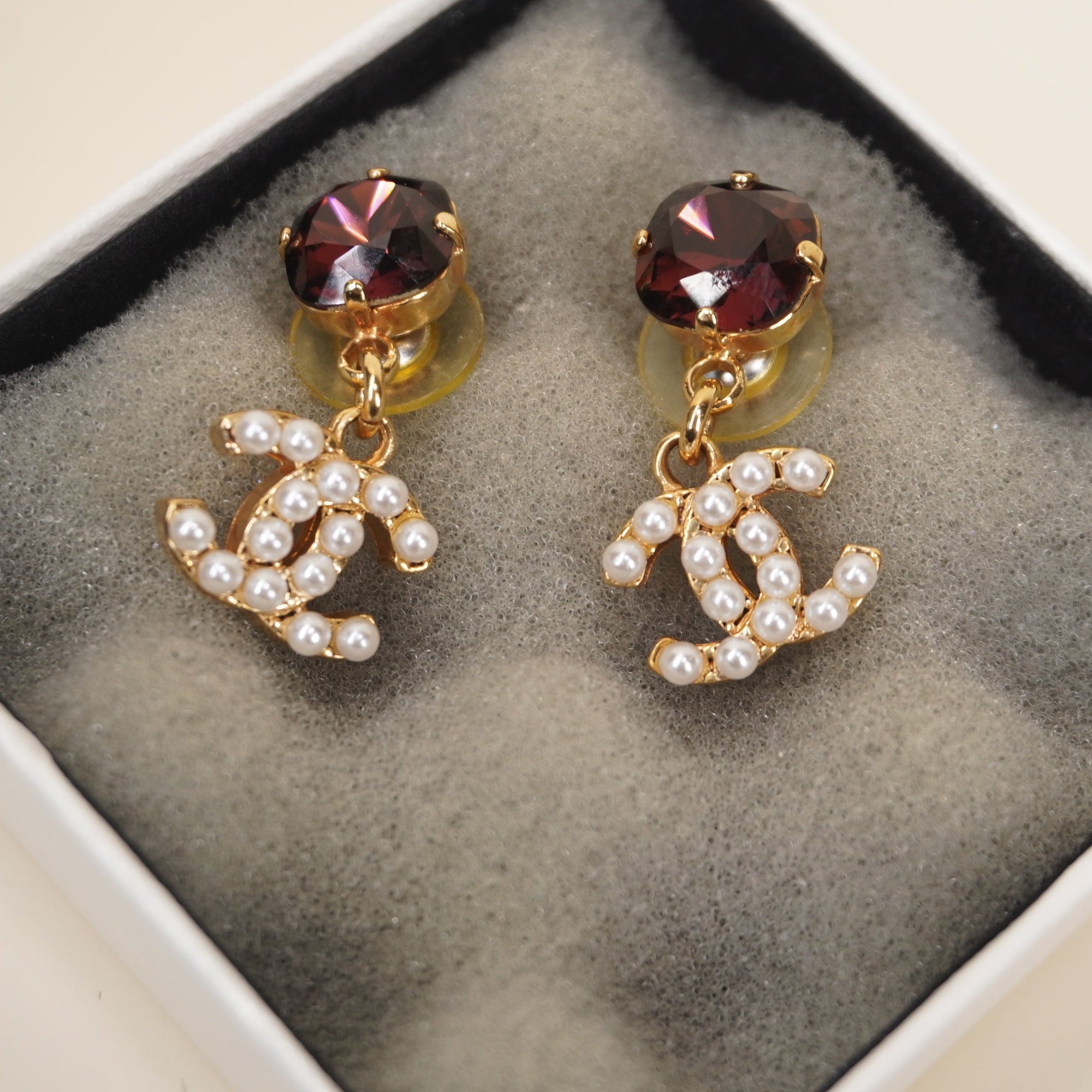 PRE-OWNED CC Drop Earrings with faux pearls and a Crystal