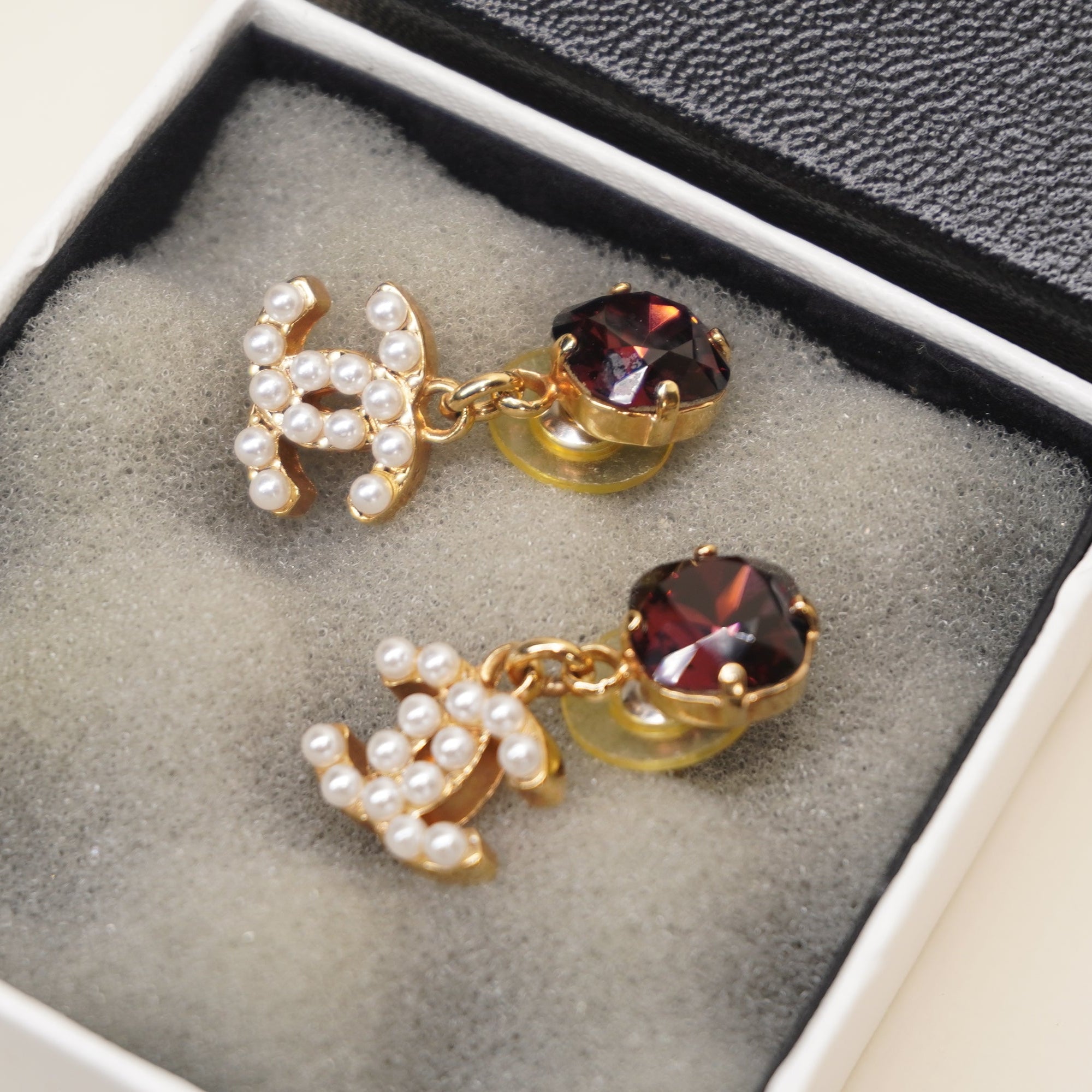 PRE-OWNED CC Drop Earrings with faux pearls and a Crystal