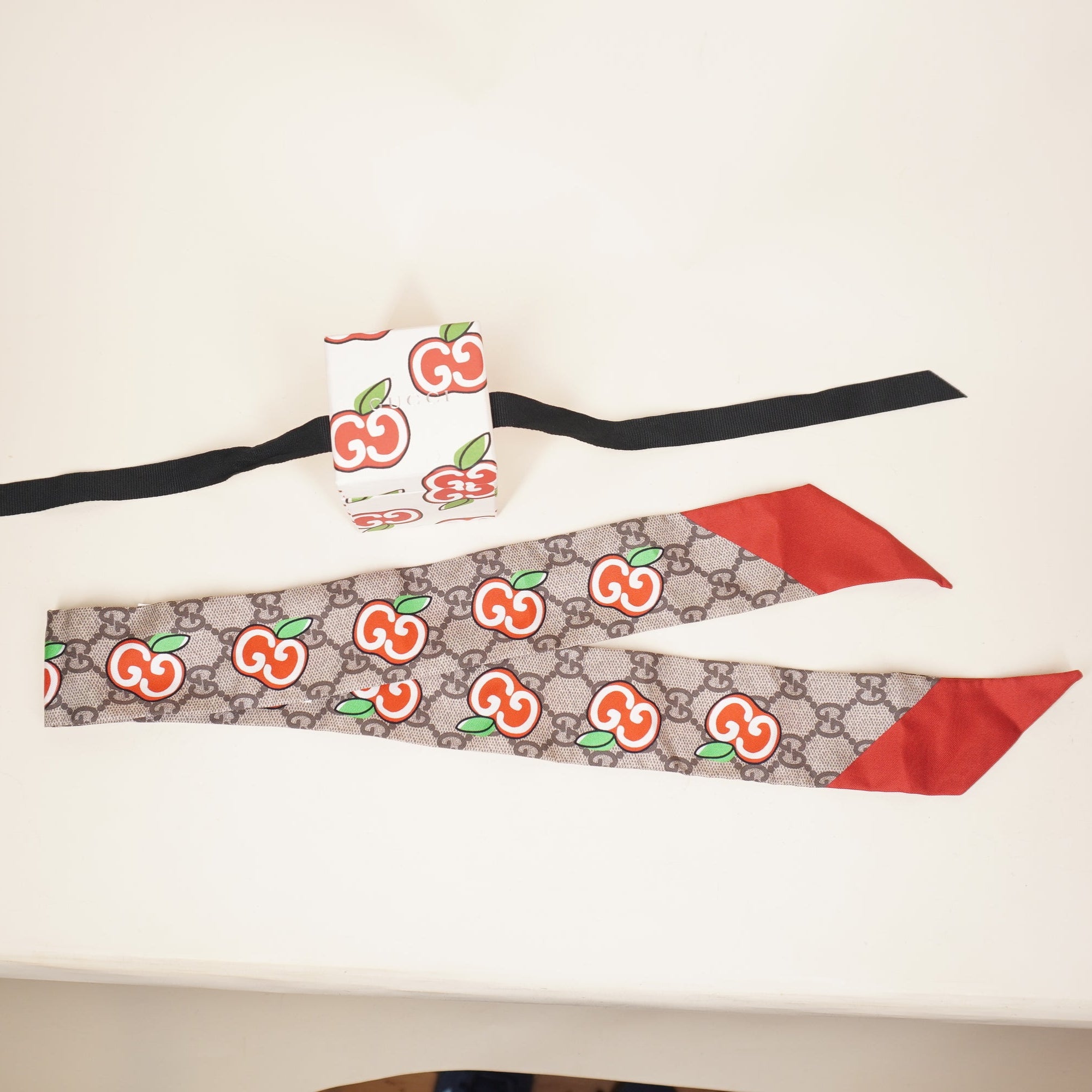 PRE-OWNED Gucci Twilly in GG Supreme Apples Silk