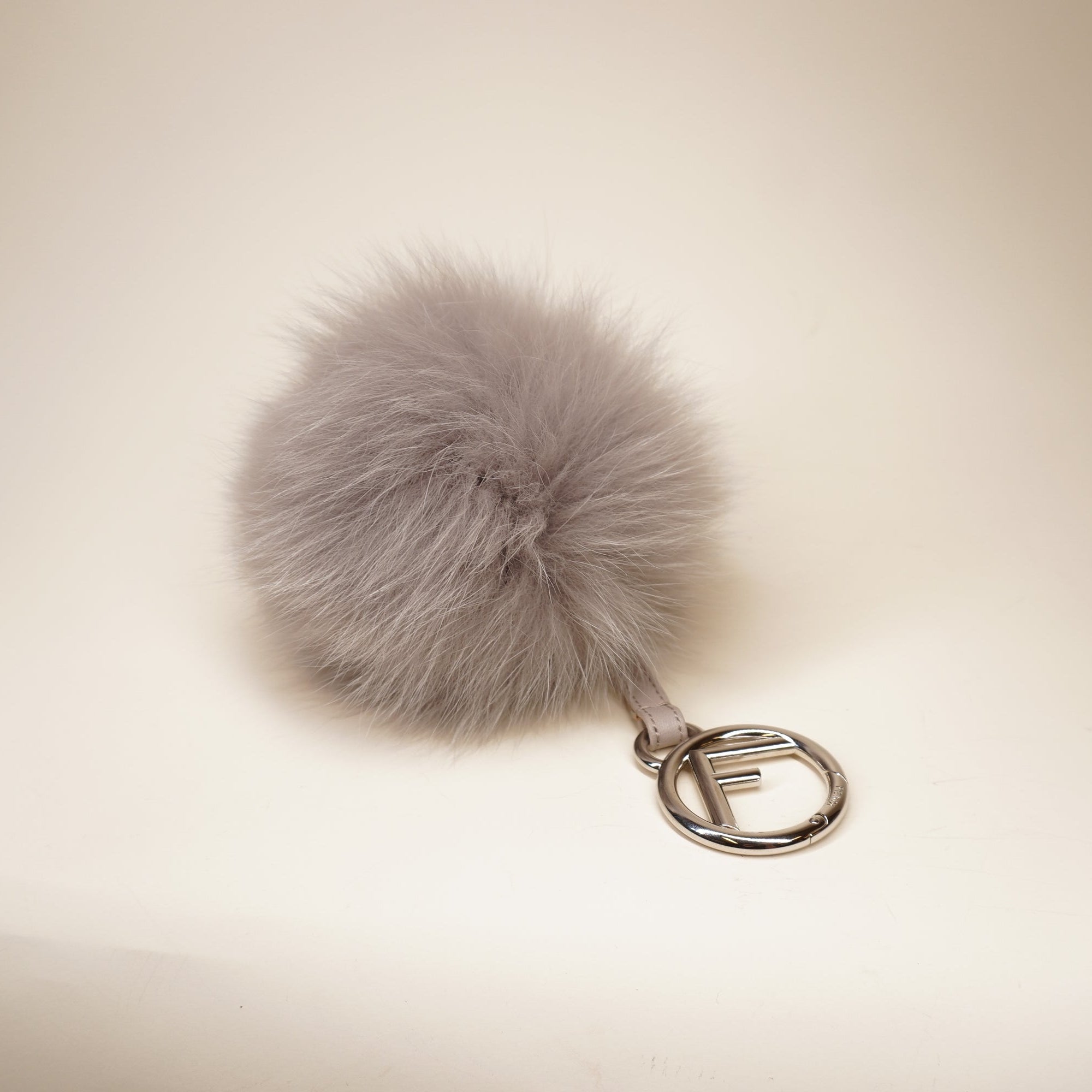 PRE-OWNED Fox Fur Pom Pom Bag Charm Grey