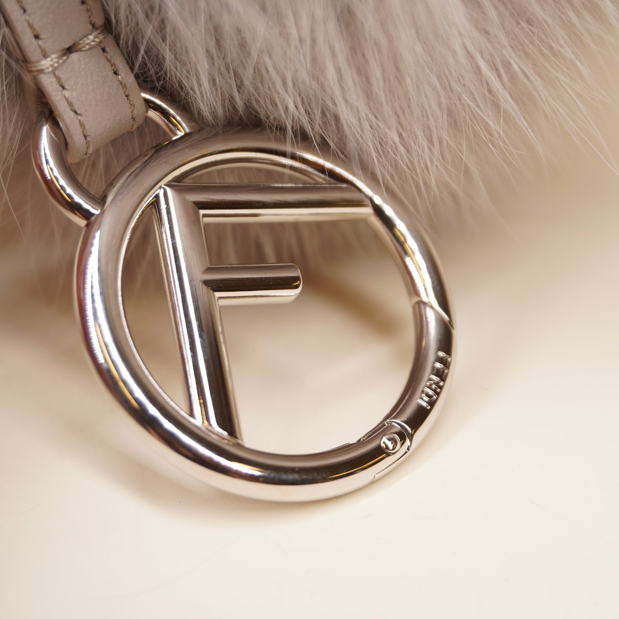 PRE-OWNED Fox Fur Pom Pom Bag Charm Grey