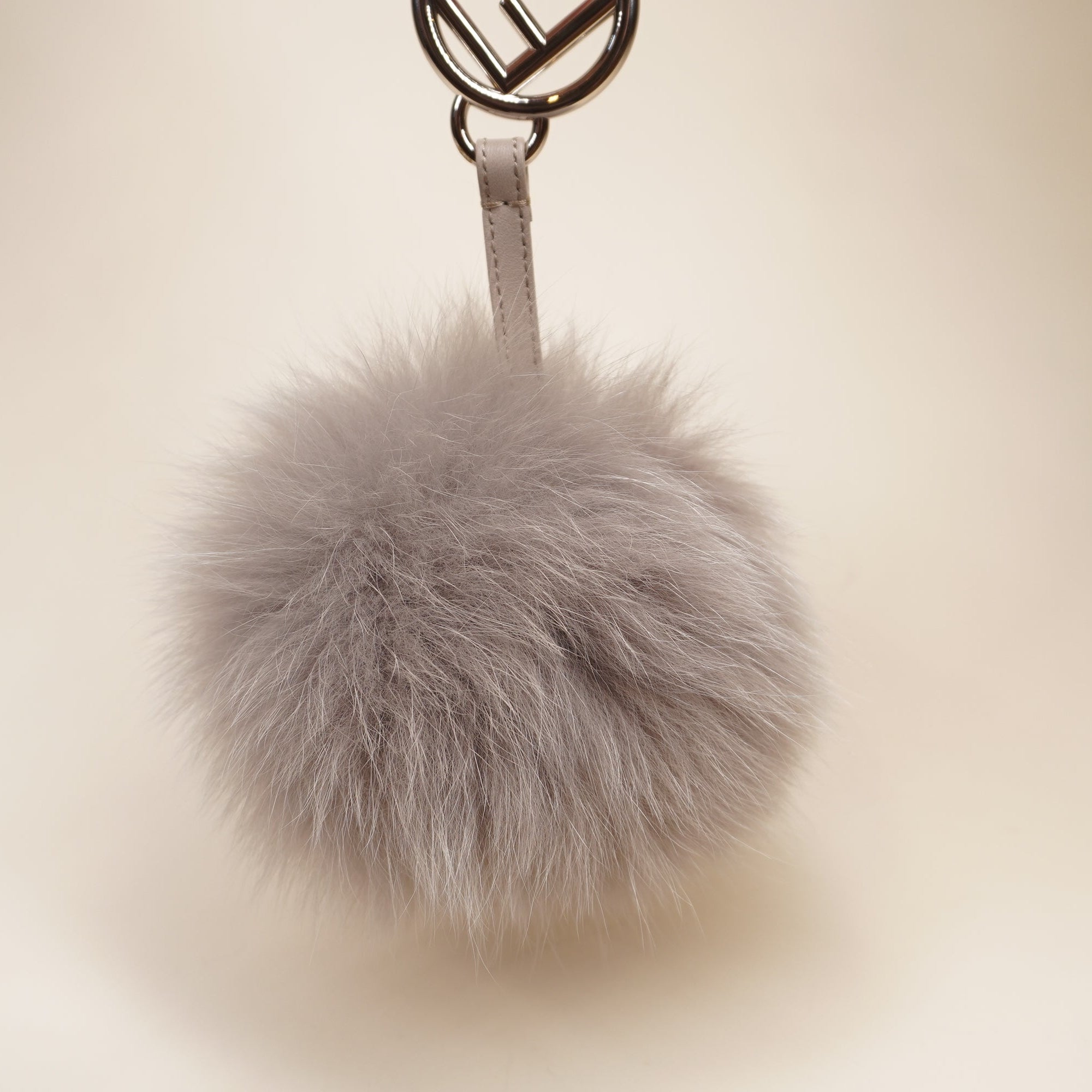 PRE-OWNED Fox Fur Pom Pom Bag Charm Grey