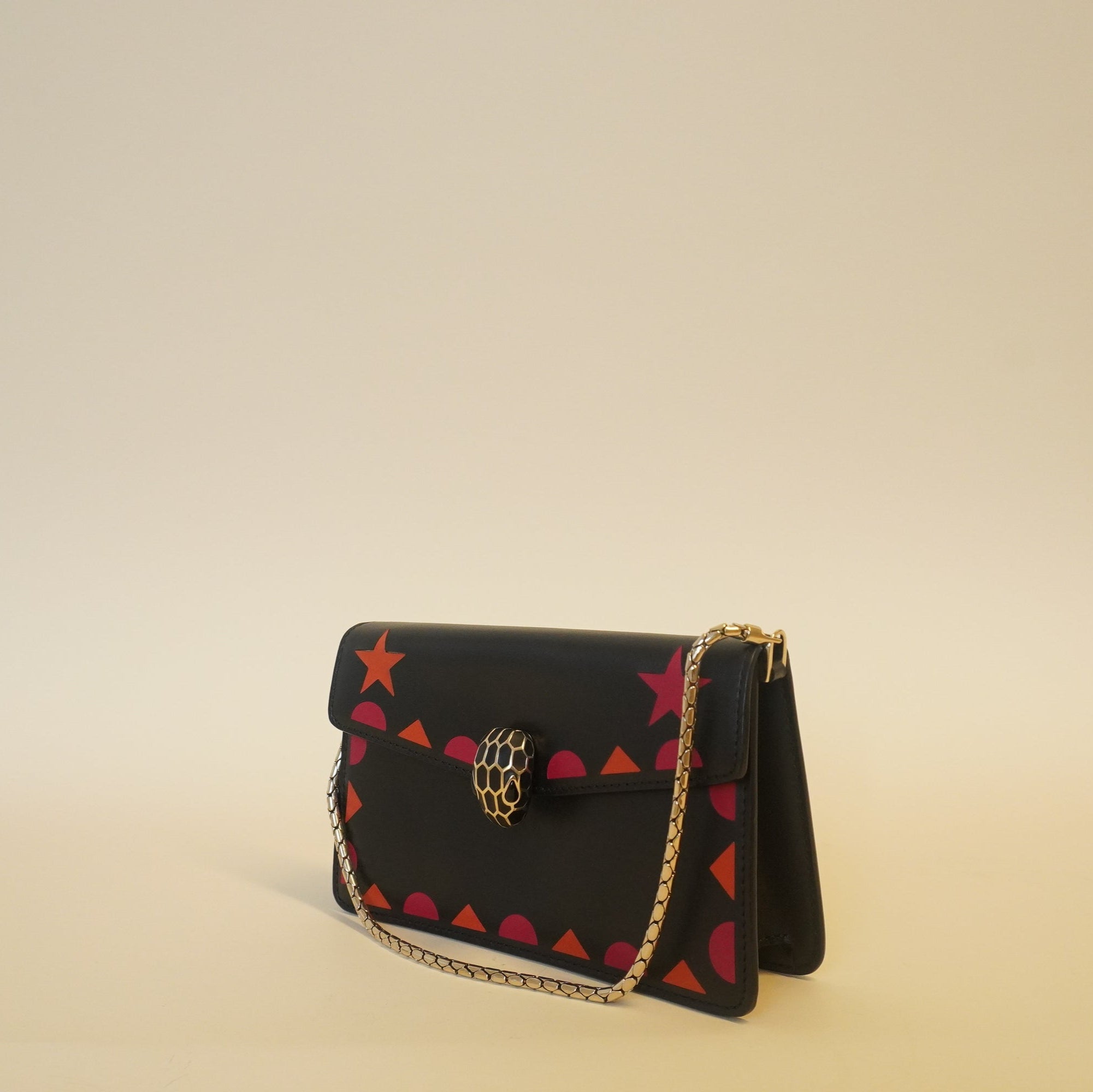 PRE-OWNED Leather Mini Serpenti Forever Star Studs Black Shoulder Bag