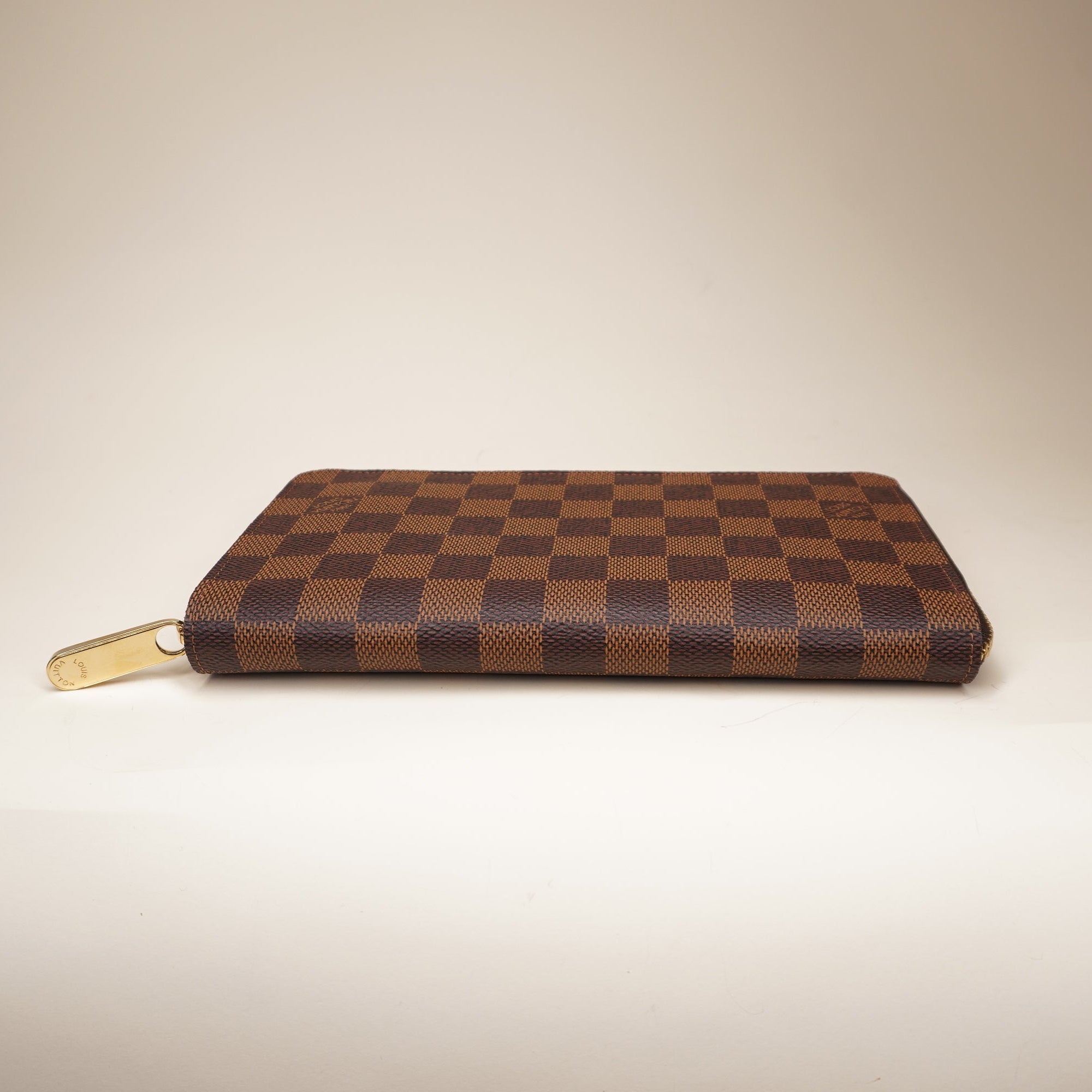 PRE-OWNED LV Damier Ebene Canvas Zippy Organizer Wallet