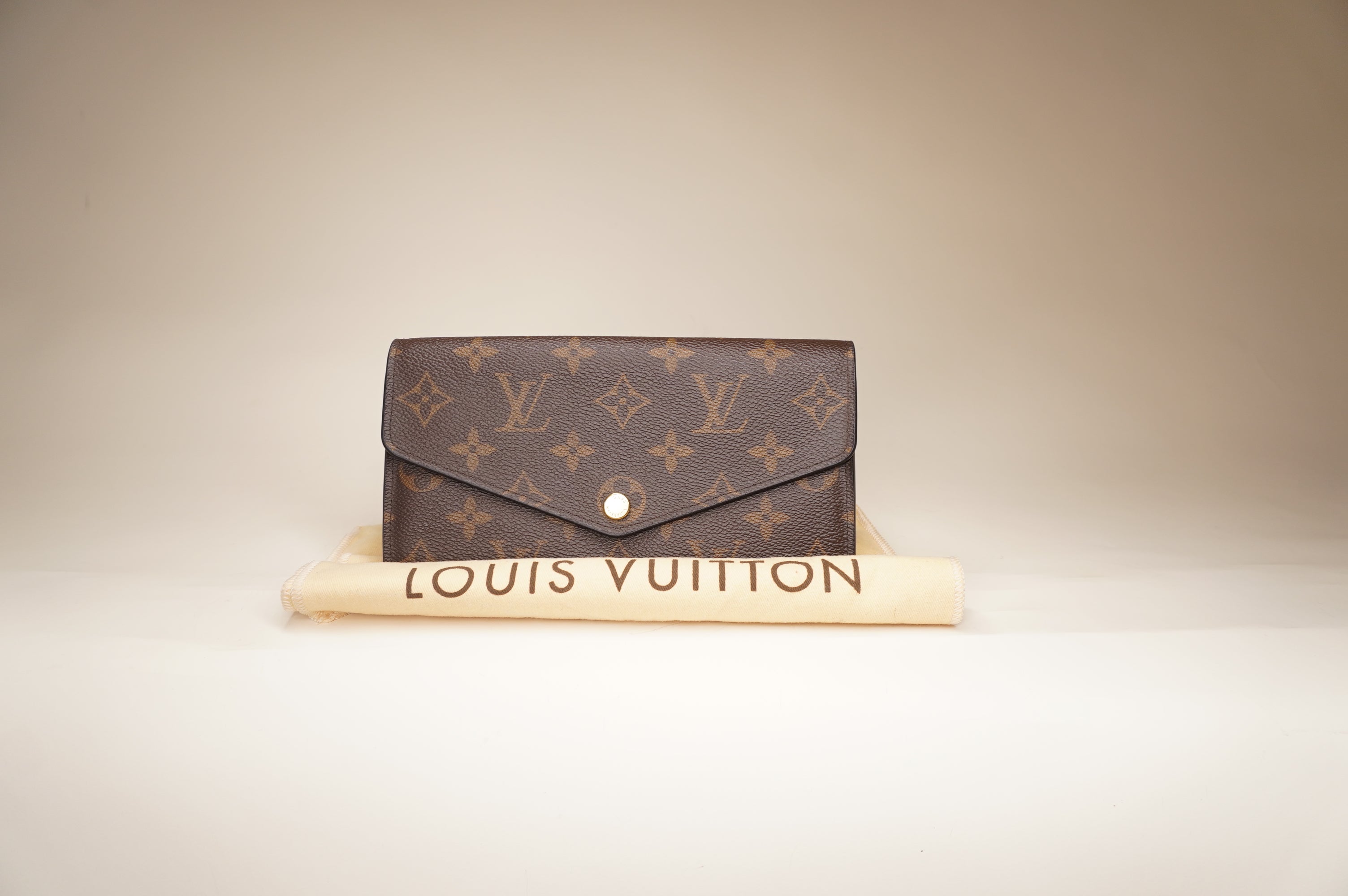 PRE-OWNED Monogram Canvas Sarah Wallet Red Inside