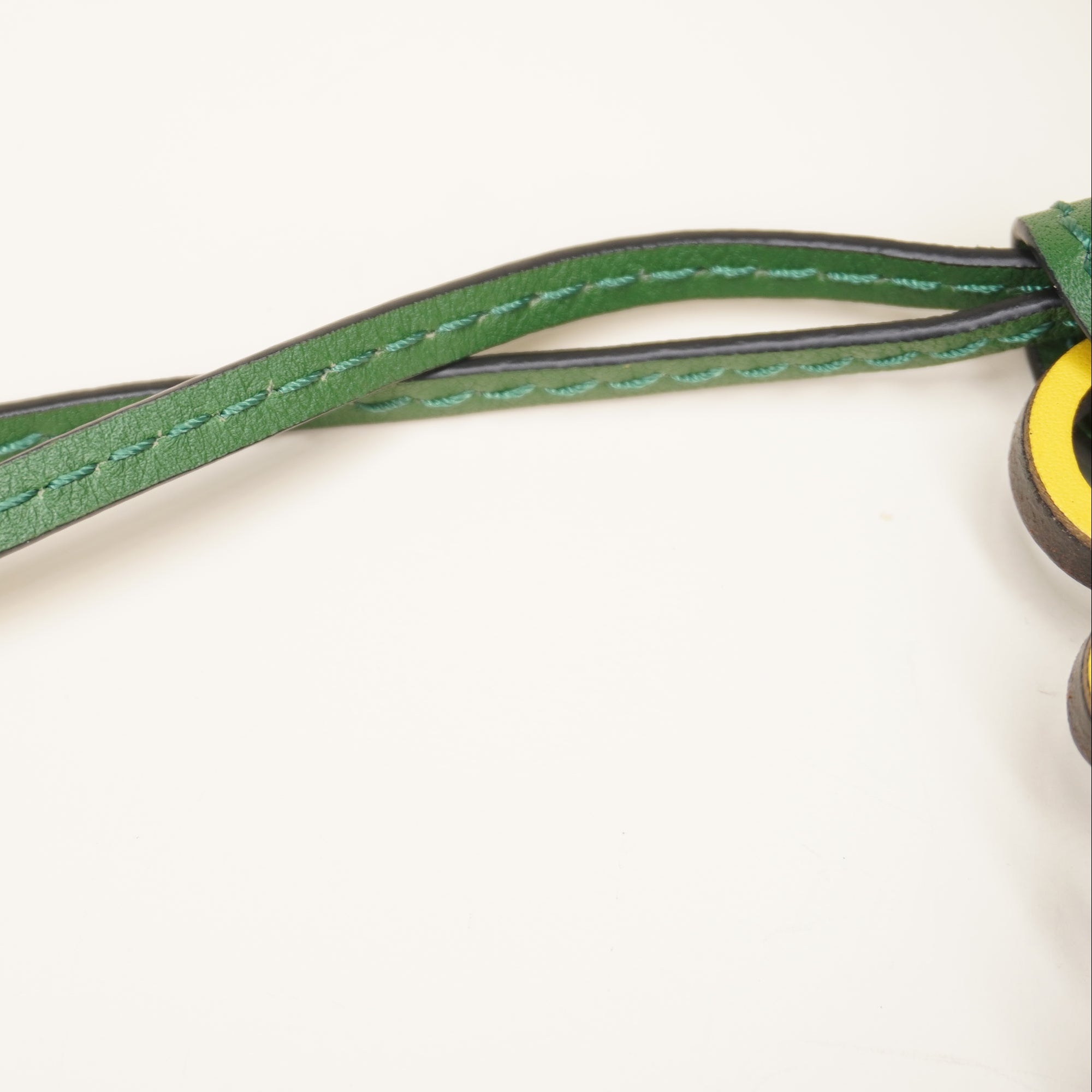 PRE-OWNED Anagram Leather Yellow and Green Long Bag Charm 