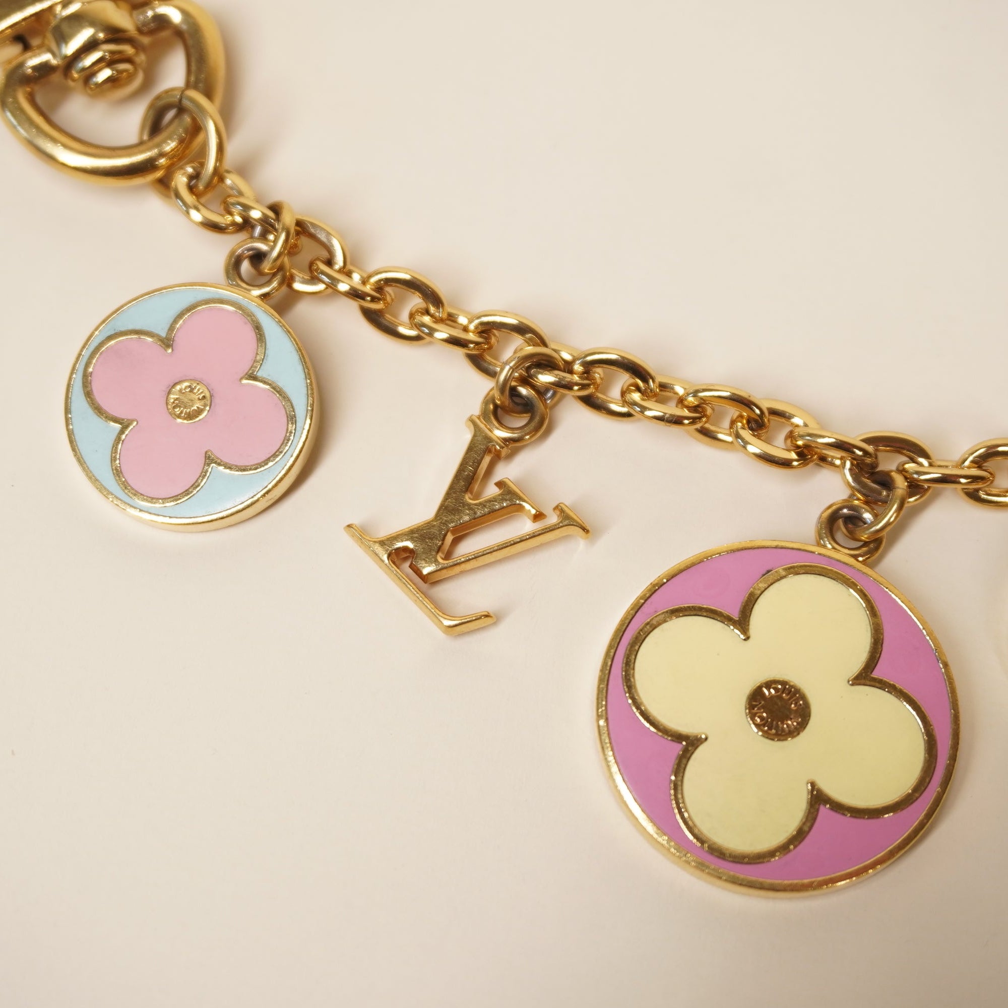 PRE-OWNED LV  Gold Flour Long Bag Charm