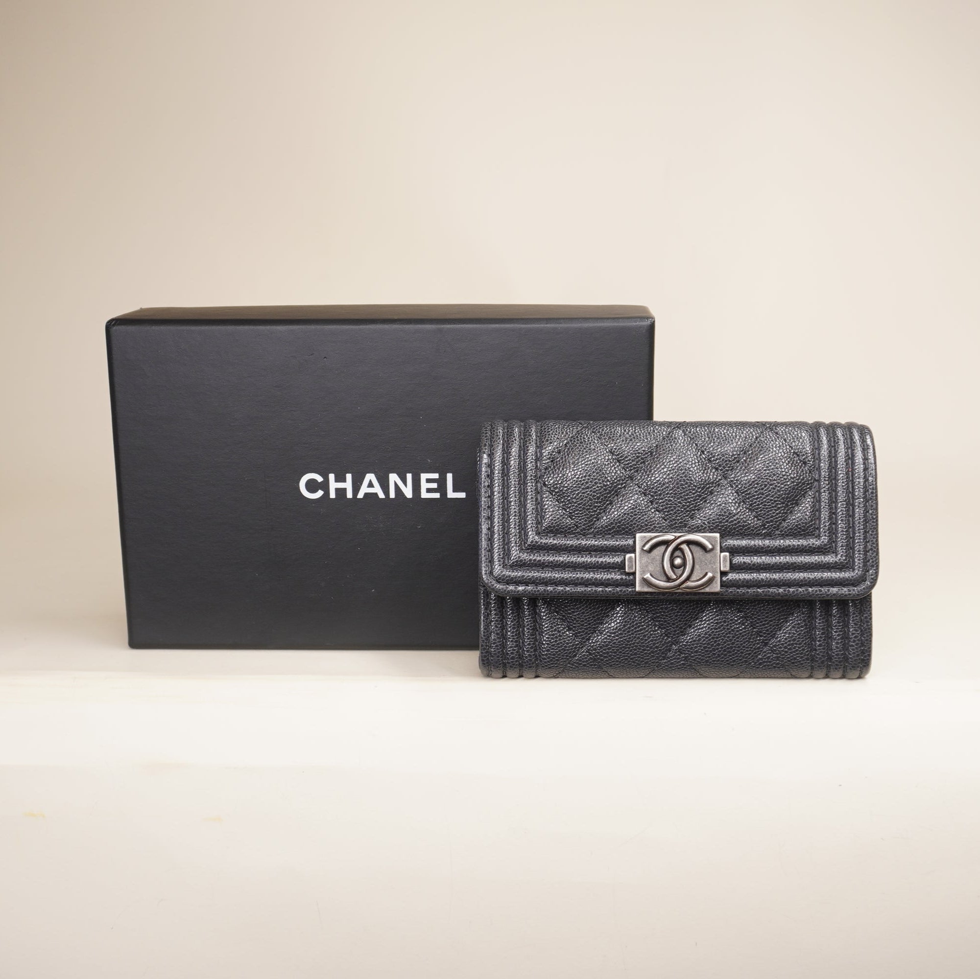 PRE-OWNED CC Black Caviar Quilted Boy Flap Card Holder