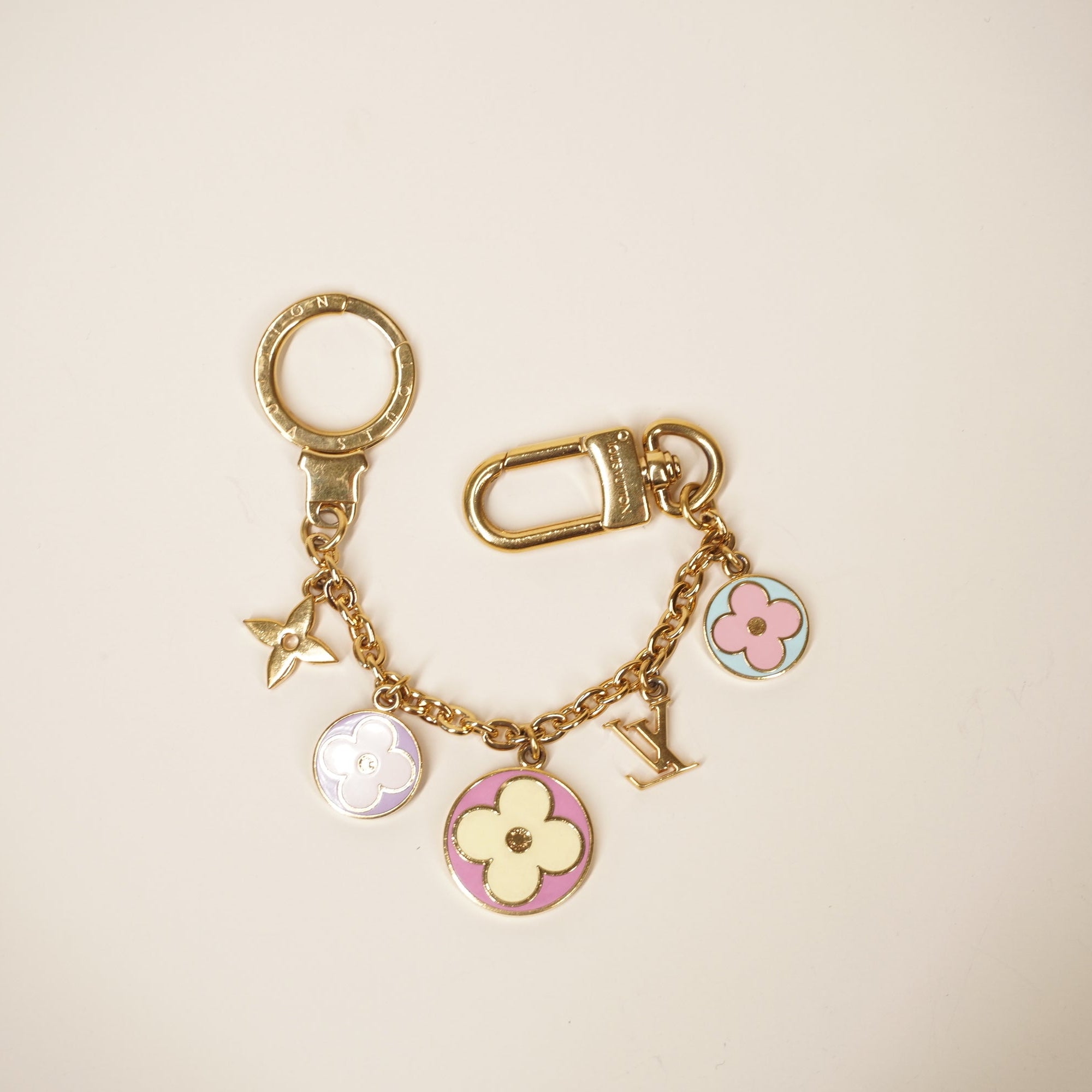 PRE-OWNED LV  Gold Flour Long Bag Charm