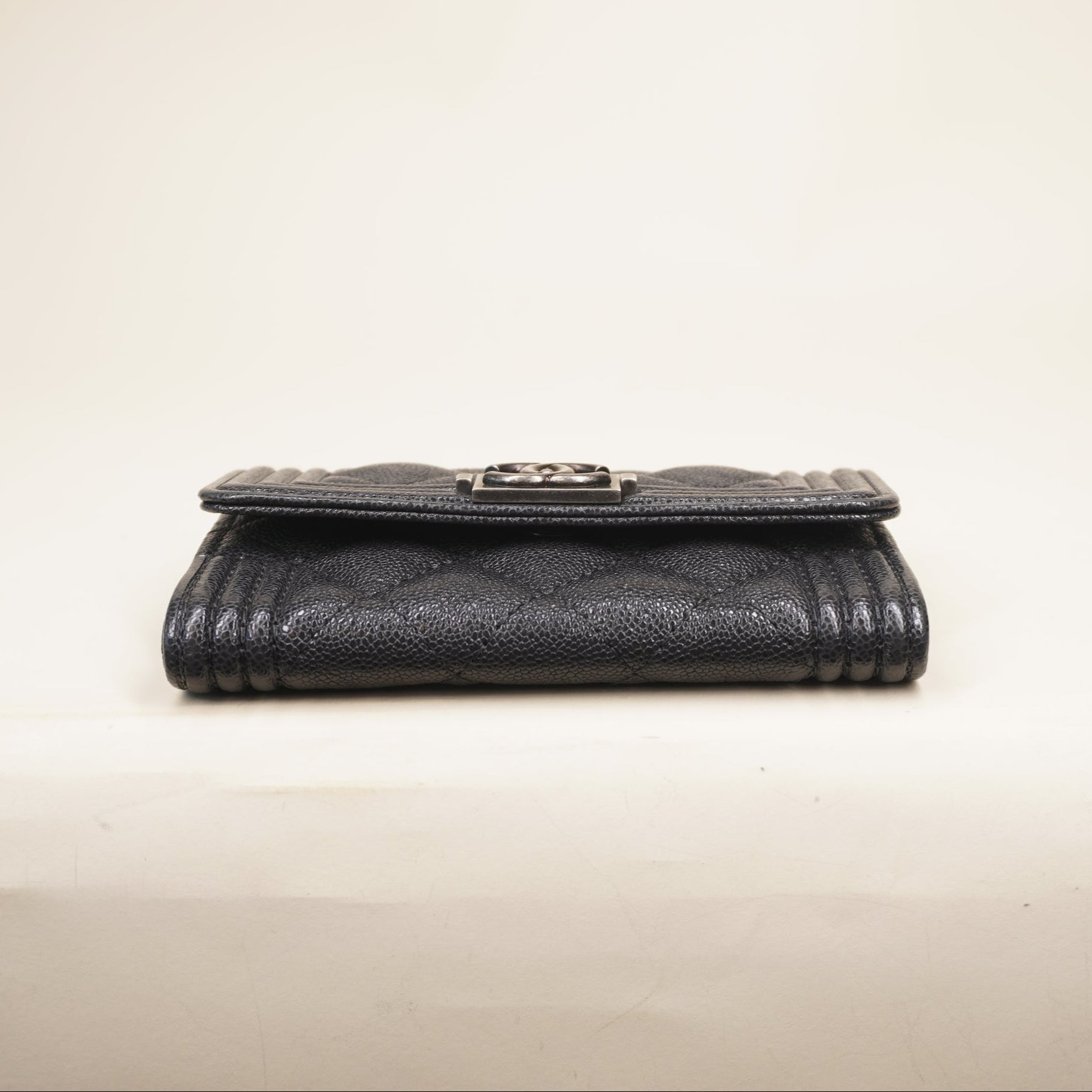 PRE-OWNED CC Black Caviar Quilted Boy Flap Card Holder