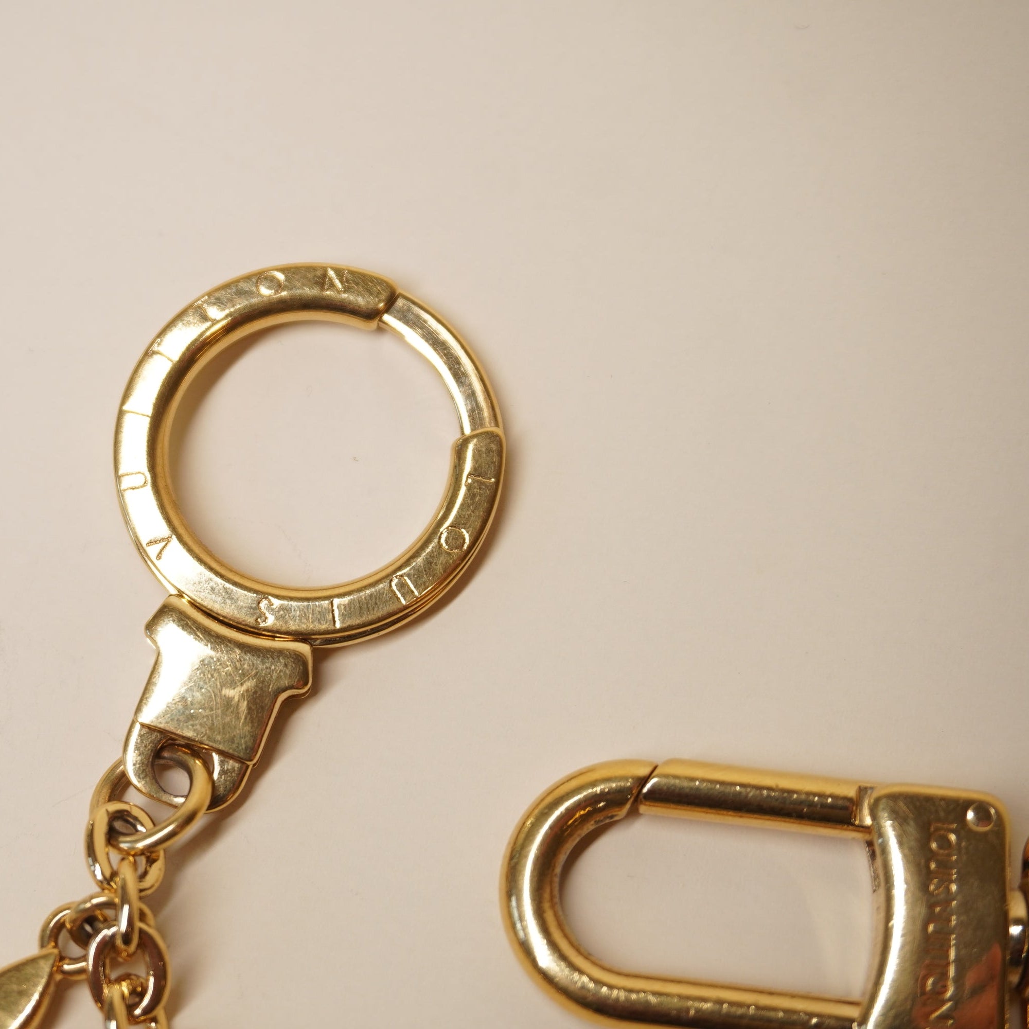 PRE-OWNED LV  Gold Flour Long Bag Charm