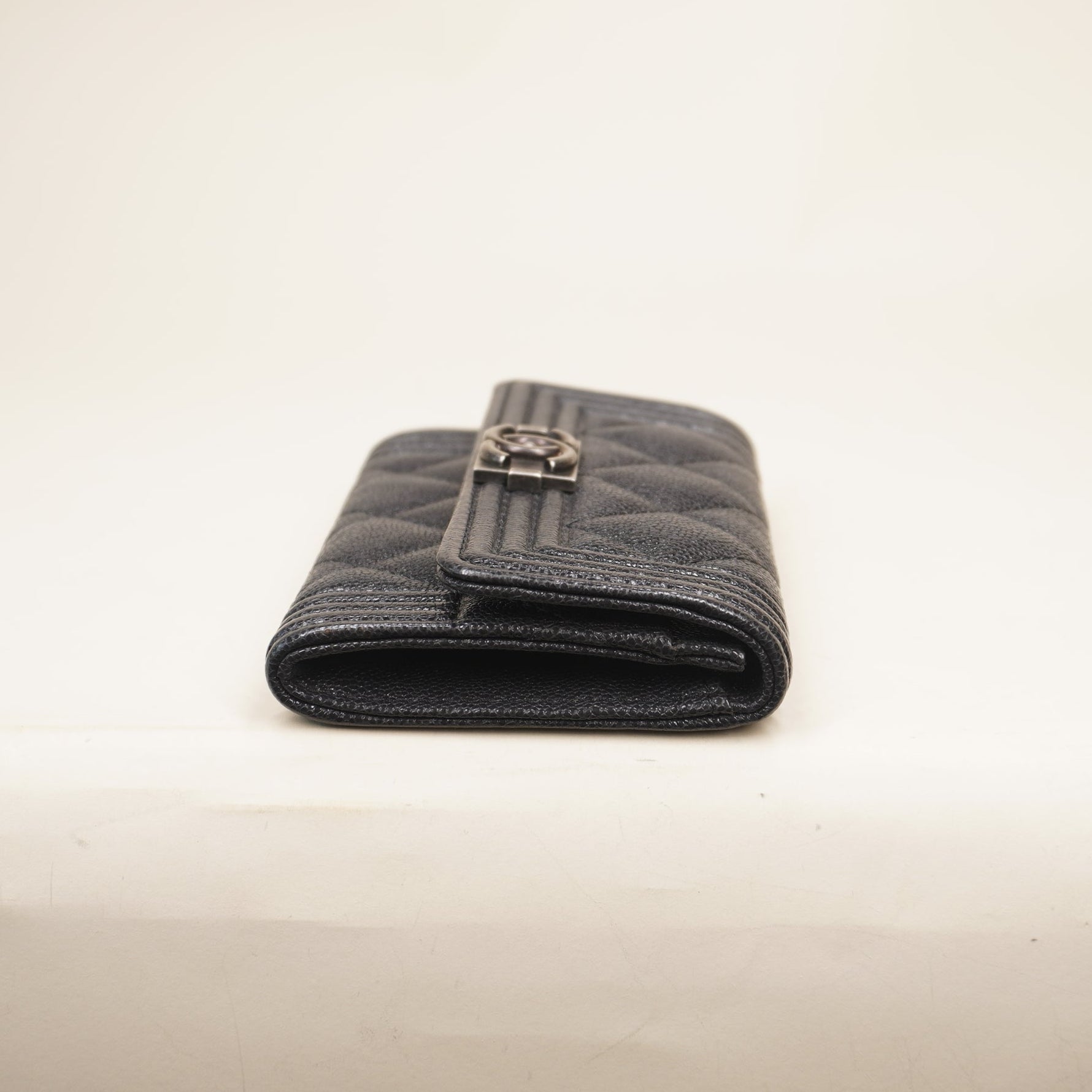 PRE-OWNED CC Black Caviar Quilted Boy Flap Card Holder