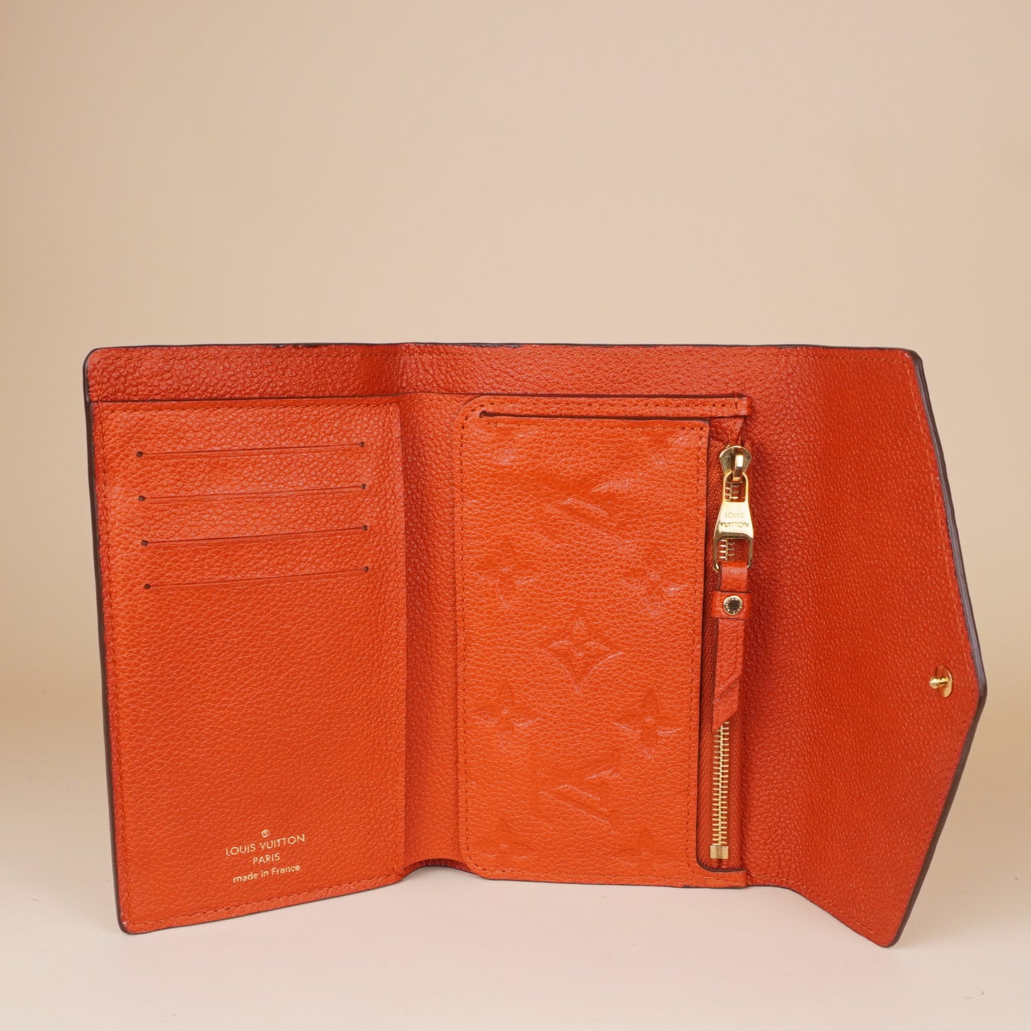 PRE-OWNED LV Orient Empreinte Leather Compact Curieuse Wallet