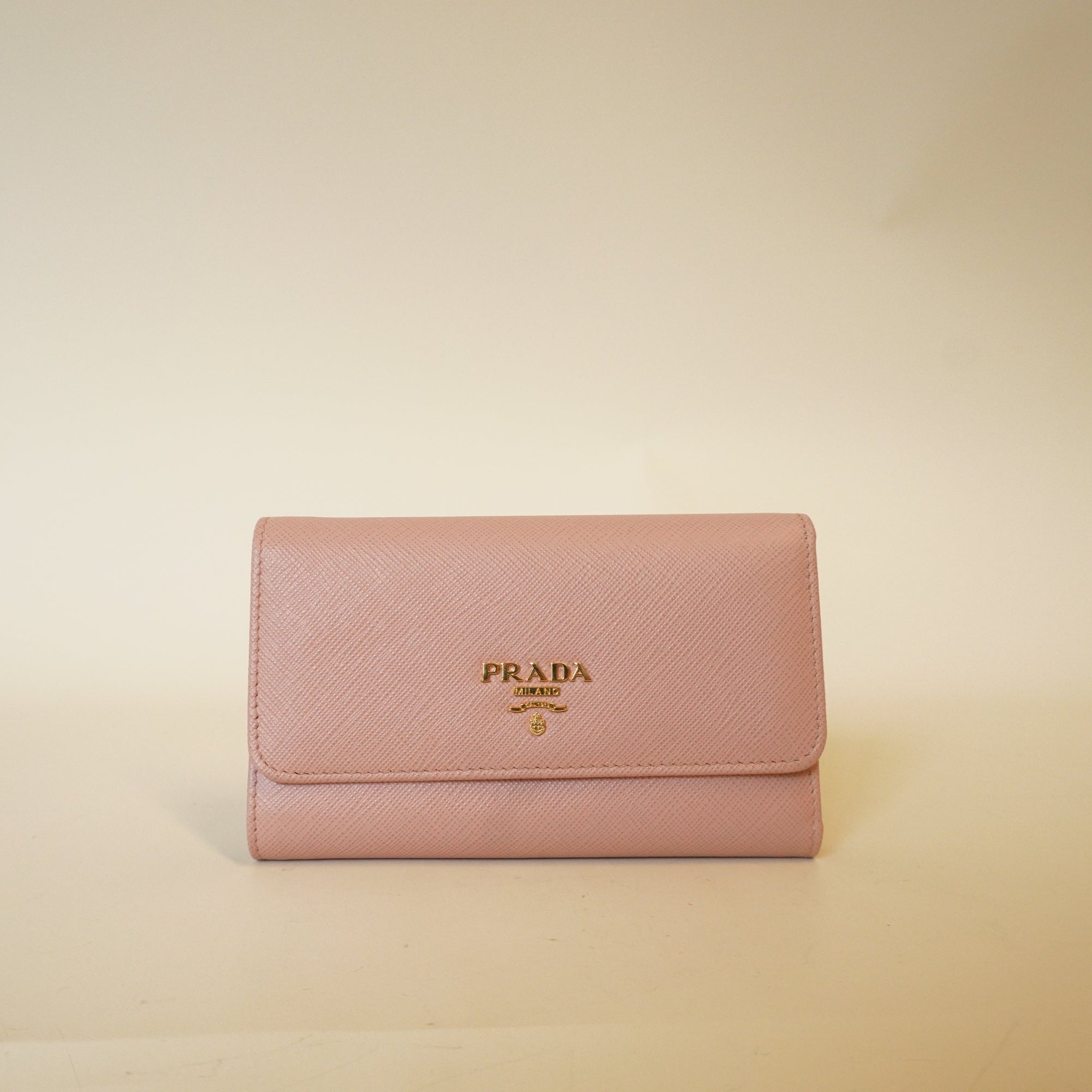 PRE-OWNED Pink Trifold Saffiano Leather Wallet