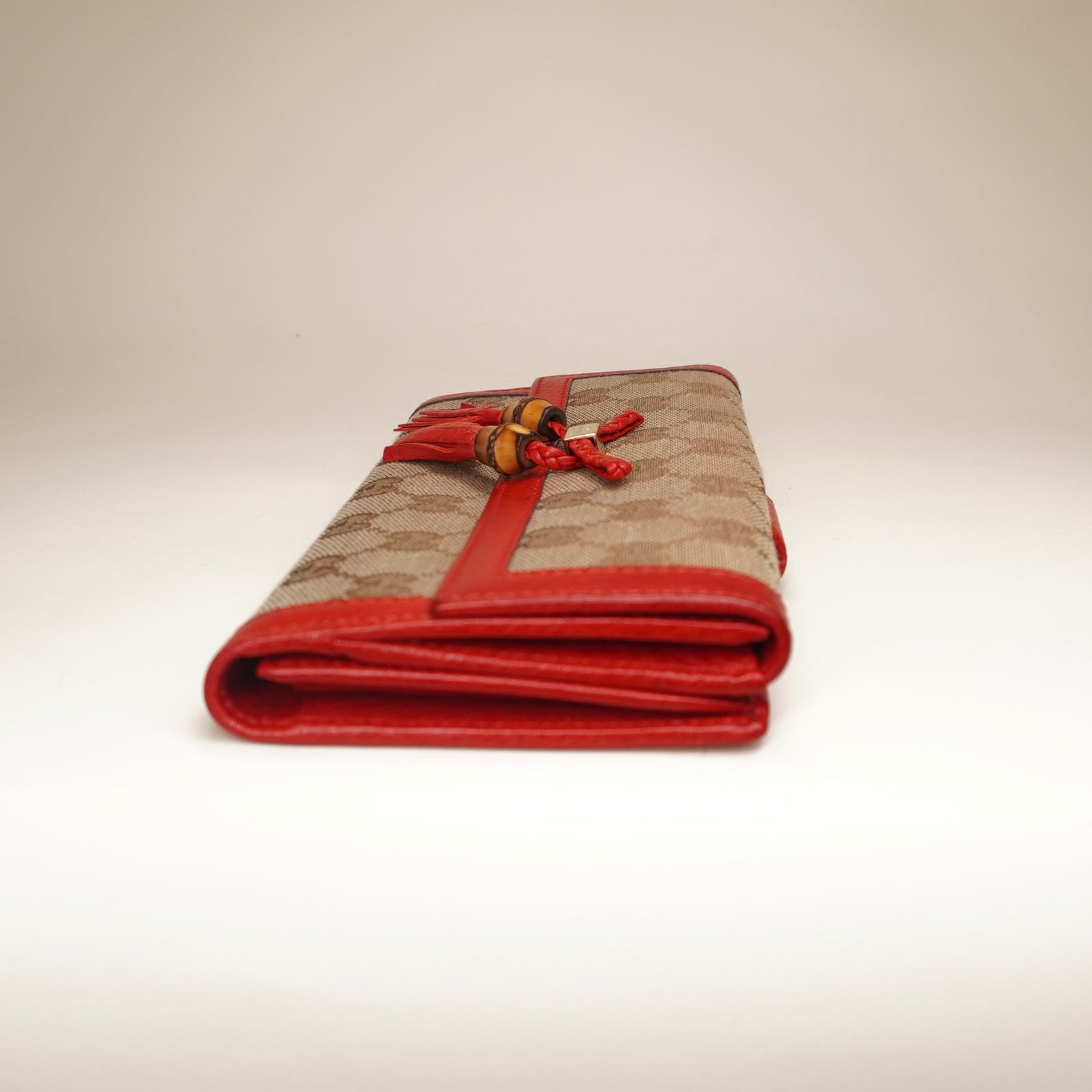 PRE-OWNED Bamboo Tassel GG Canvas Continental Red Wallet