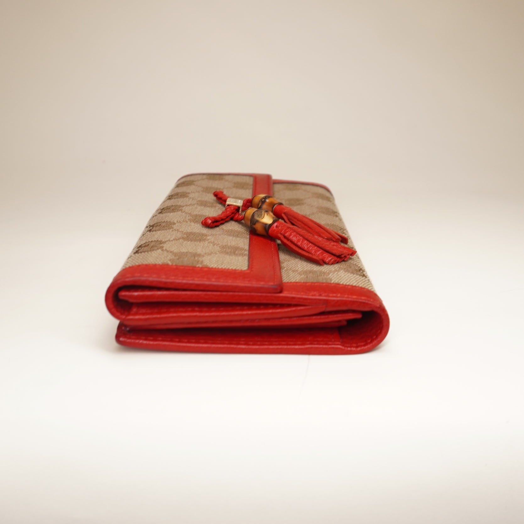 PRE-OWNED Bamboo Tassel GG Canvas Continental Red Wallet