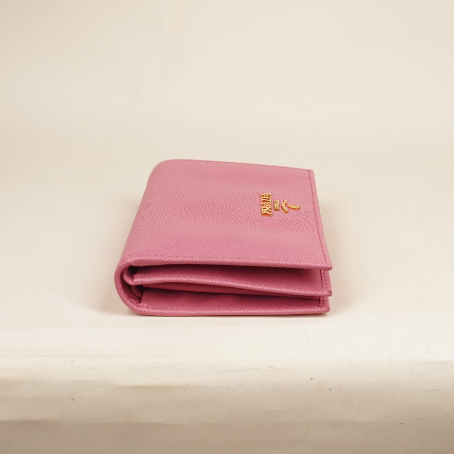 PRE-OWNED Saffiano Metal Compact Snap Bi-Fold Wallet Petalo