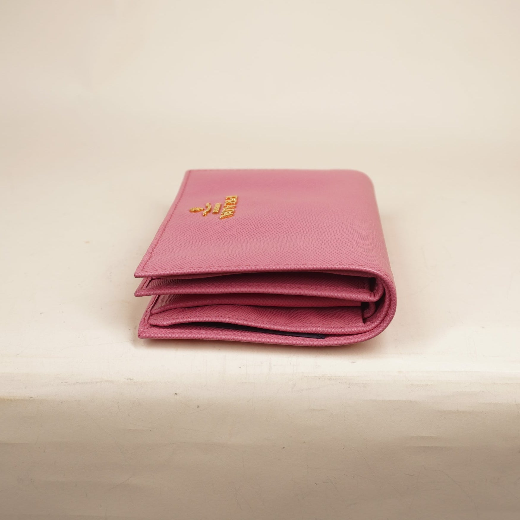 PRE-OWNED Saffiano Metal Compact Snap Bi-Fold Wallet Petalo