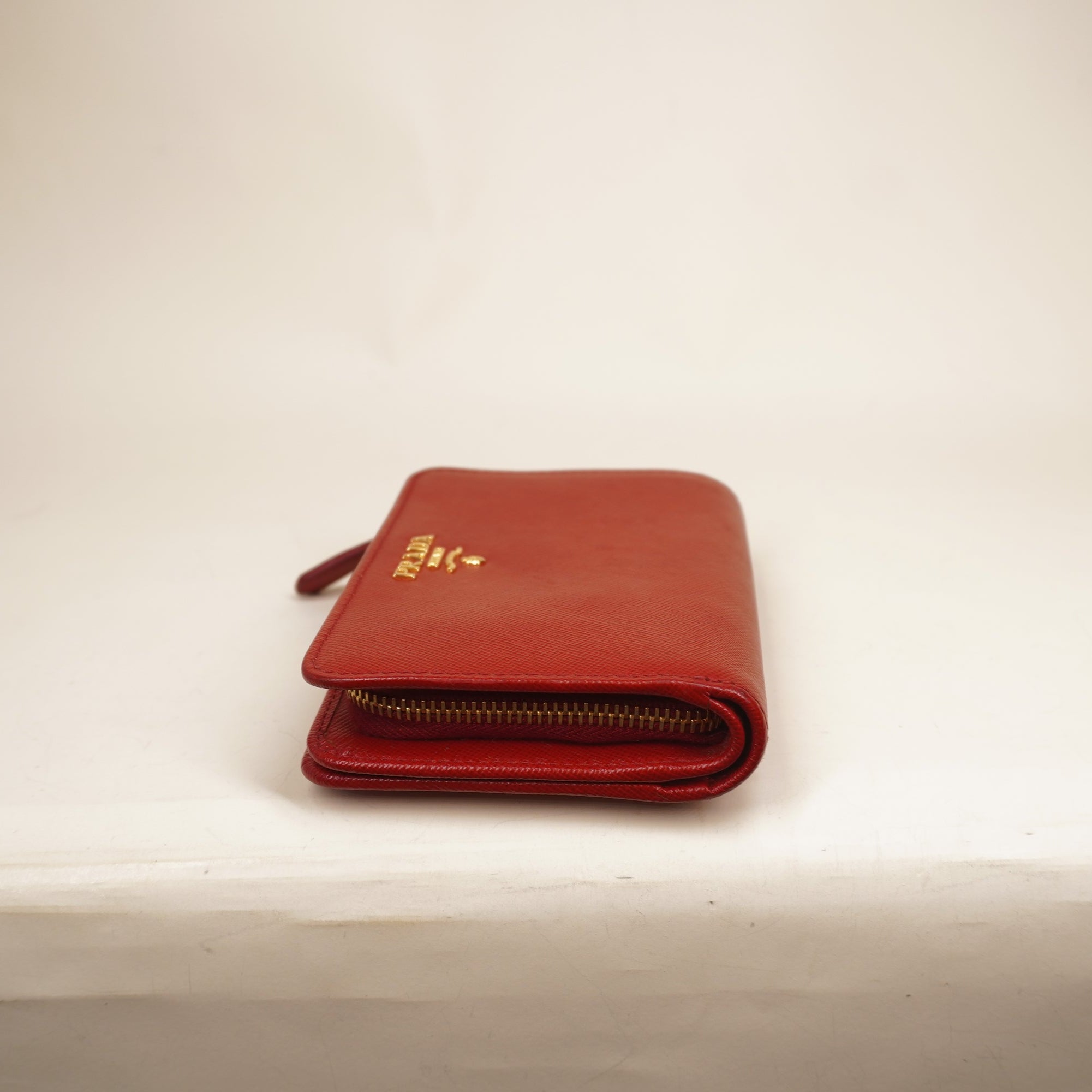 PRE-OWNED Red Saffiano Metal Compact Wallet Fuoco
