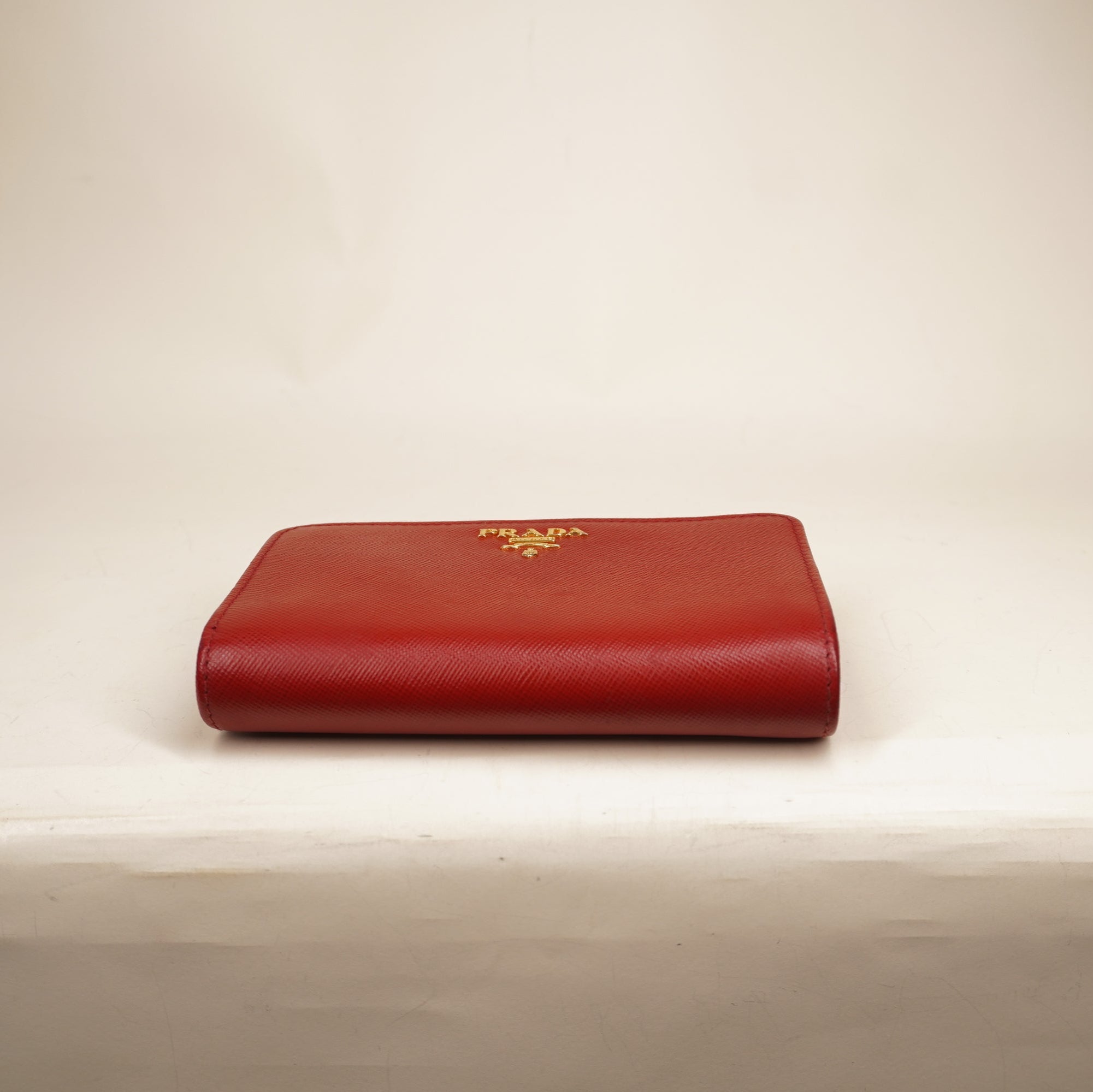 PRE-OWNED Red Saffiano Metal Compact Wallet Fuoco