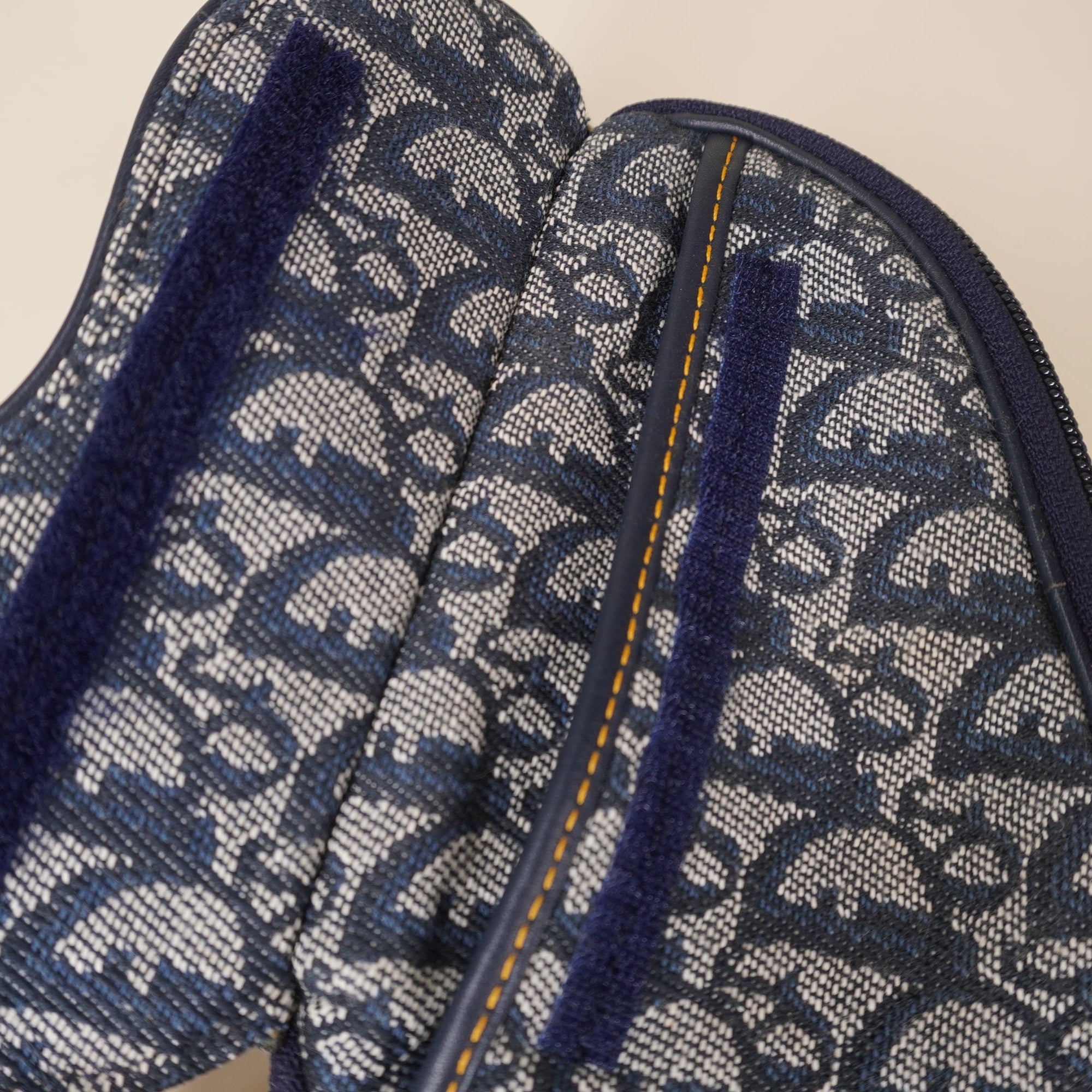 PRE-OWNED Monogram Mini Saddle Zip Pouch Navy Blue