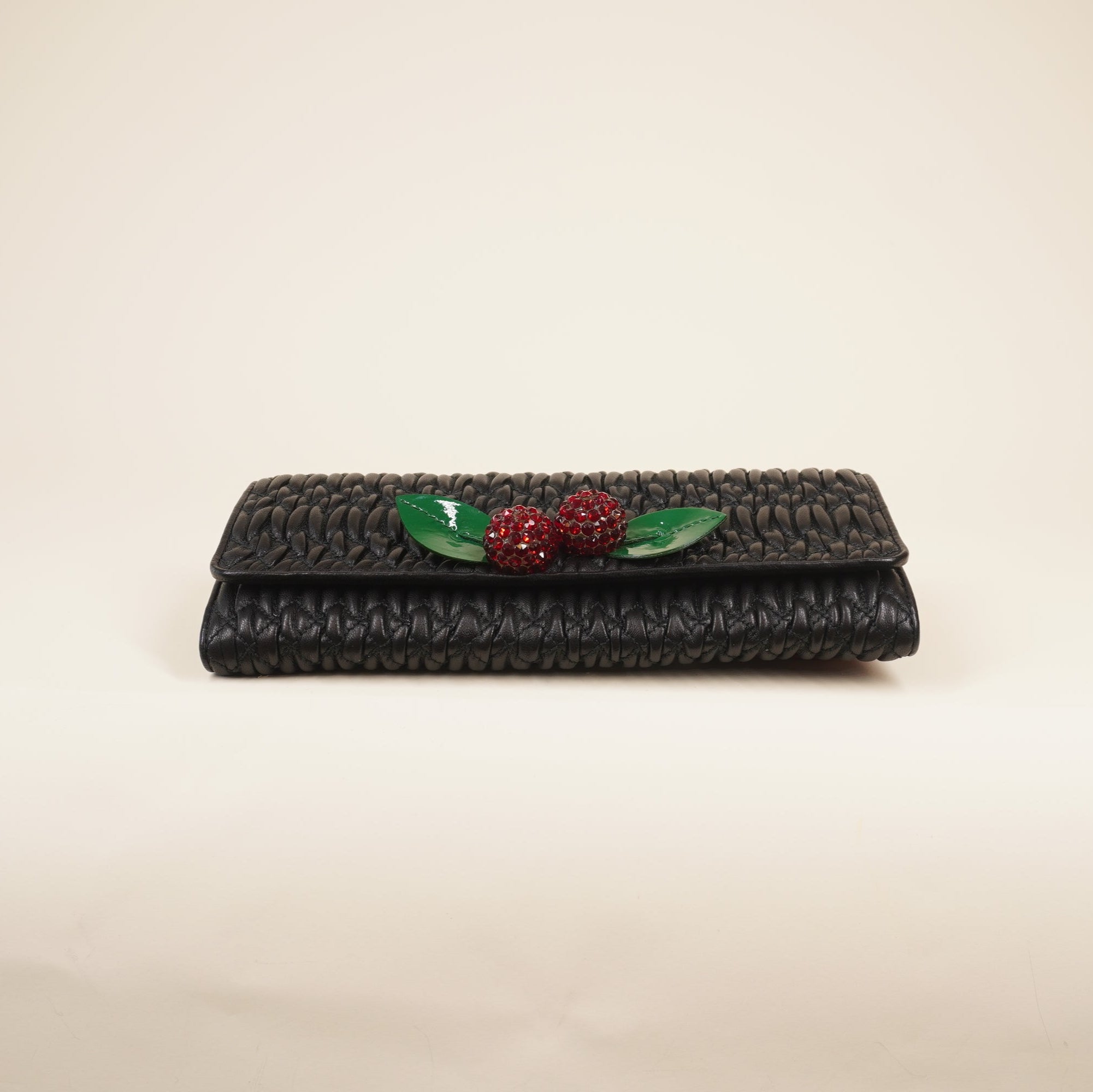 PRE-OWNED Black Nappa Matelasse Crystal Cherry Wallet On Chain