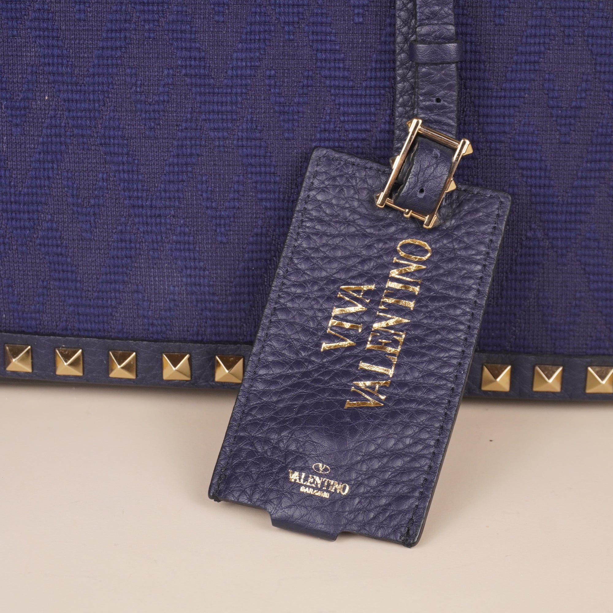 PRE-OWNED Navy Blue Leather Rockstud Wristlet Clutch