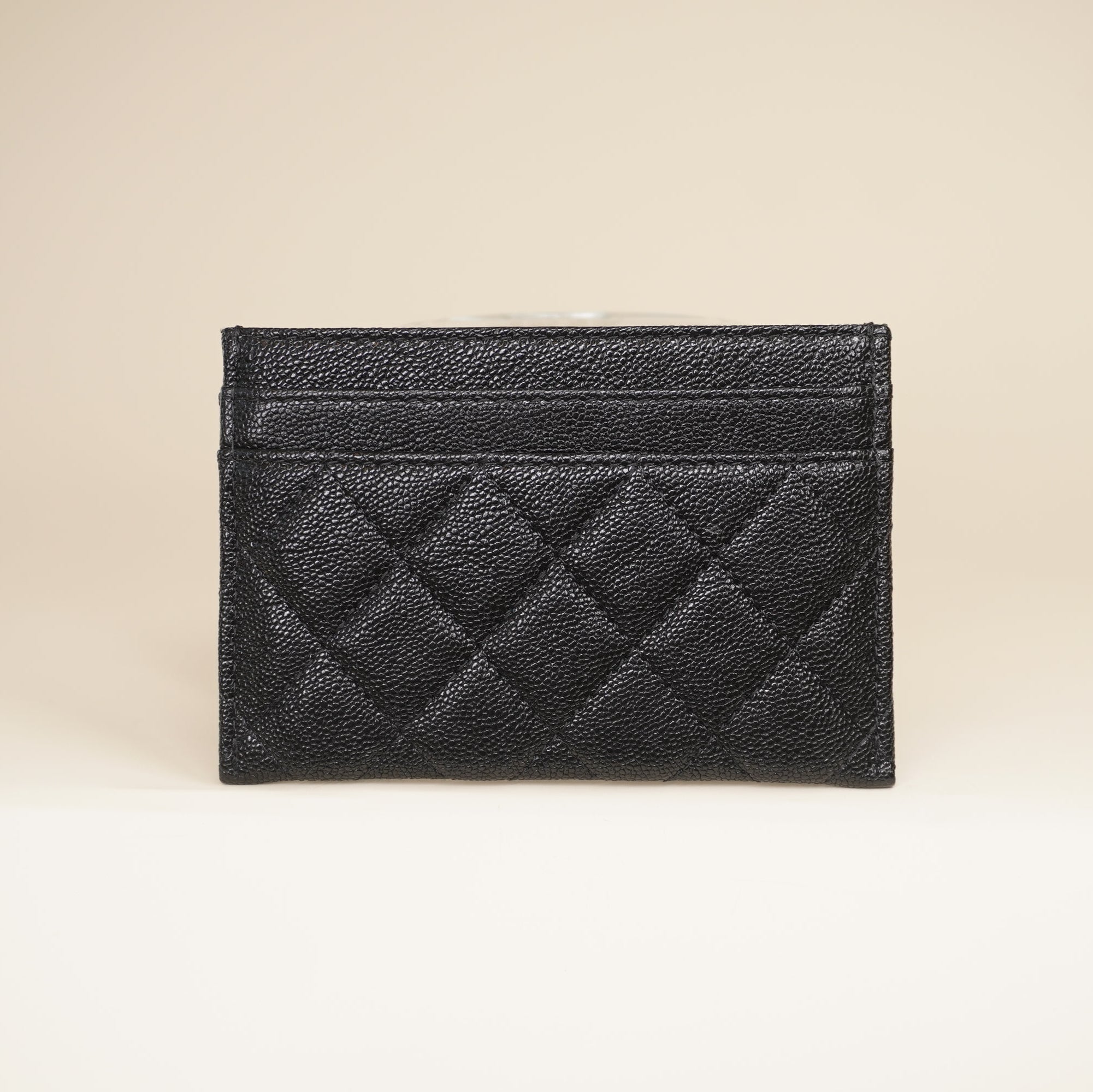 PRE-OWNED CC Black Caviar Quilted Boy Card Holder