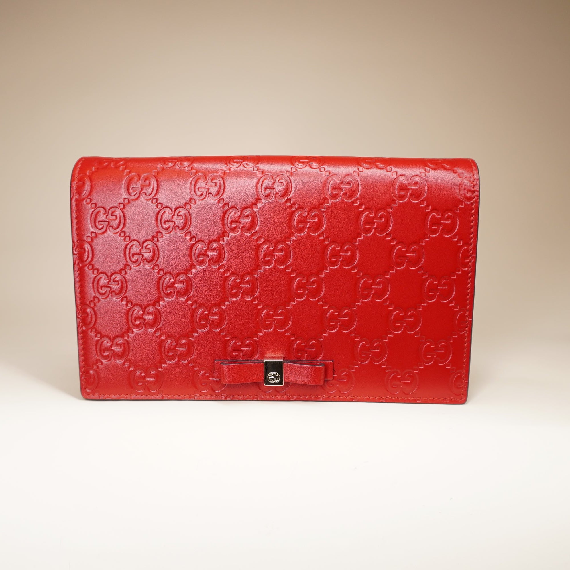 PRE-OWNED Hibiscus Red Guccissima Leather Signature WOC